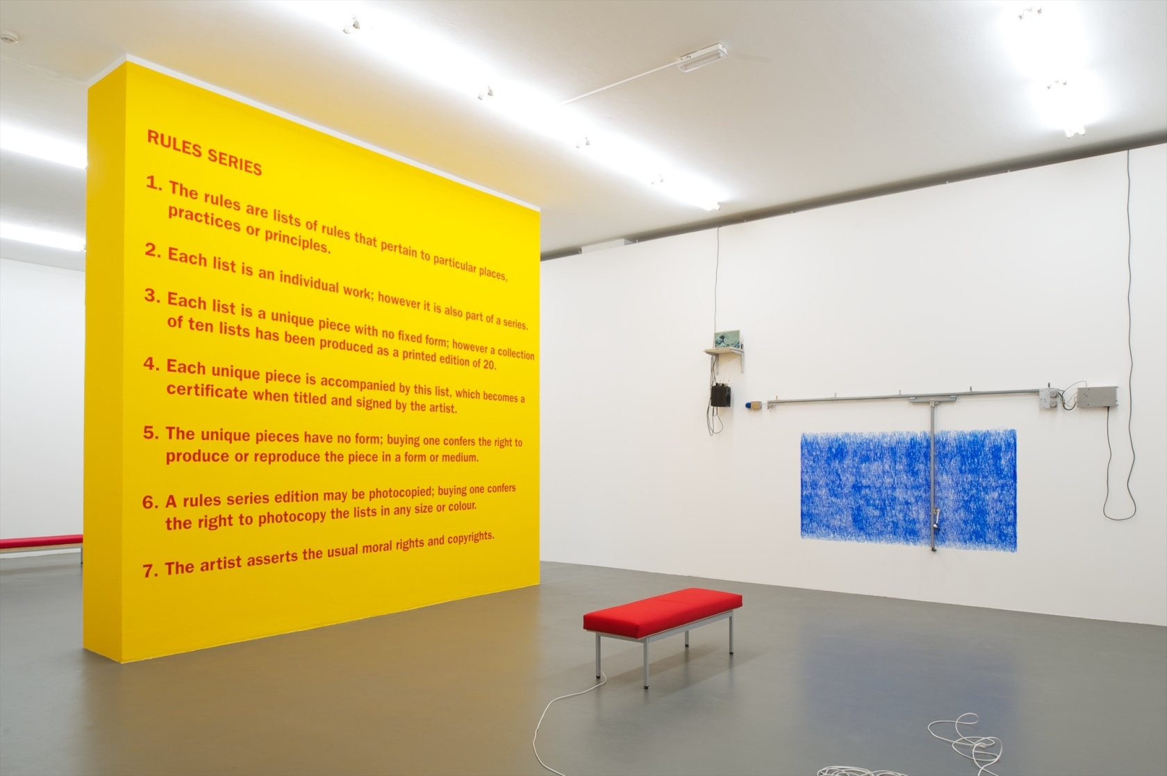 General Wall of Rules, 1996 (left) Installation, printed paper, white frame, plexiglass panels Angela Bulloch’s work spans many media, but...