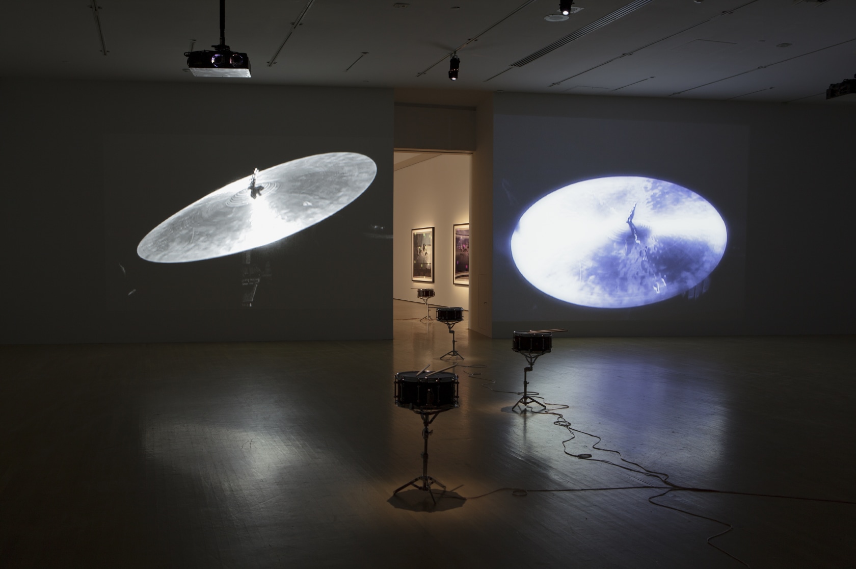 After Three Minutes, 2007 (both sides of the door) Two-channel video installation Doldrums, 2008 (on the floor) Altered Brady snare...