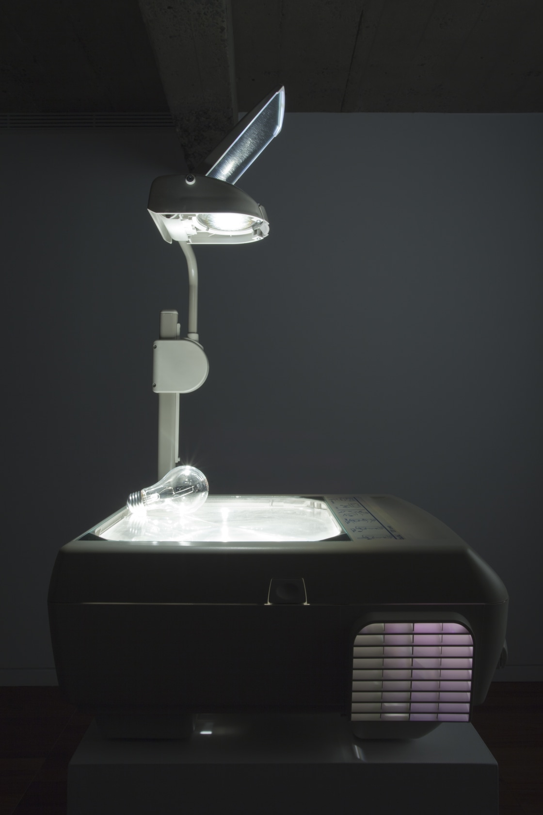 Overhead Projection, 2006 Incandescent light bulb on overhead projector The image of a clear glass bulb is thrown up high...