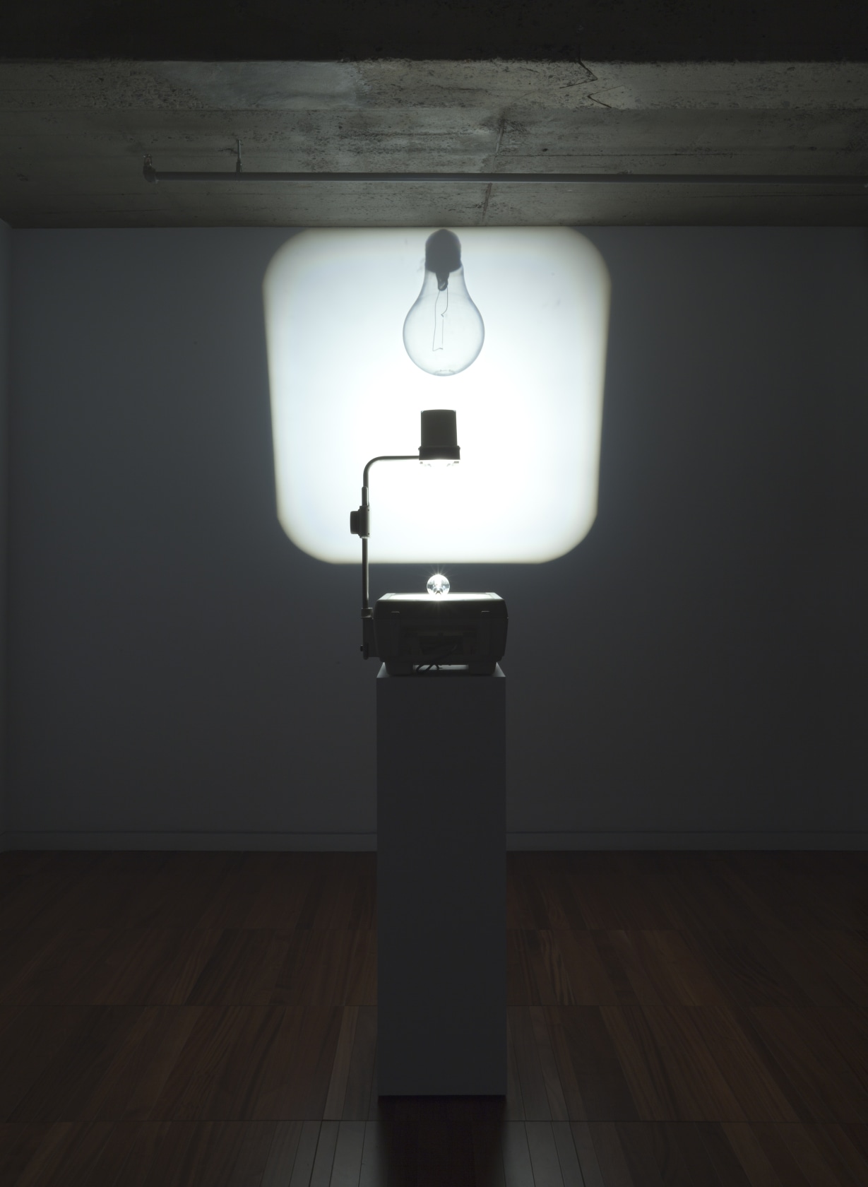 Overhead Projection, 2006 Incandescent light bulb on overhead projector The image of a clear glass bulb is thrown up high...