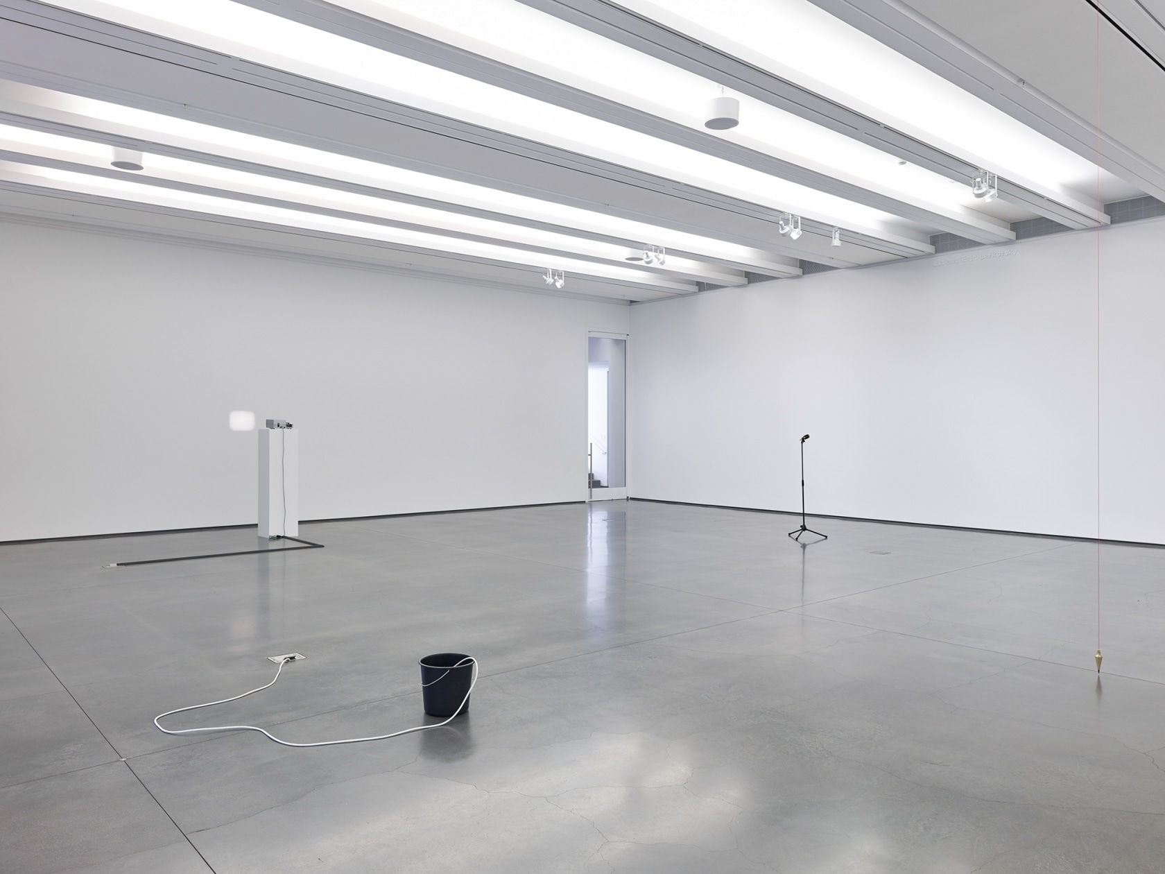 Clockwise from front left: Bucket, 1999 CD, portable CD player with a single, active audio speaker, black plastic bucket, electrical...