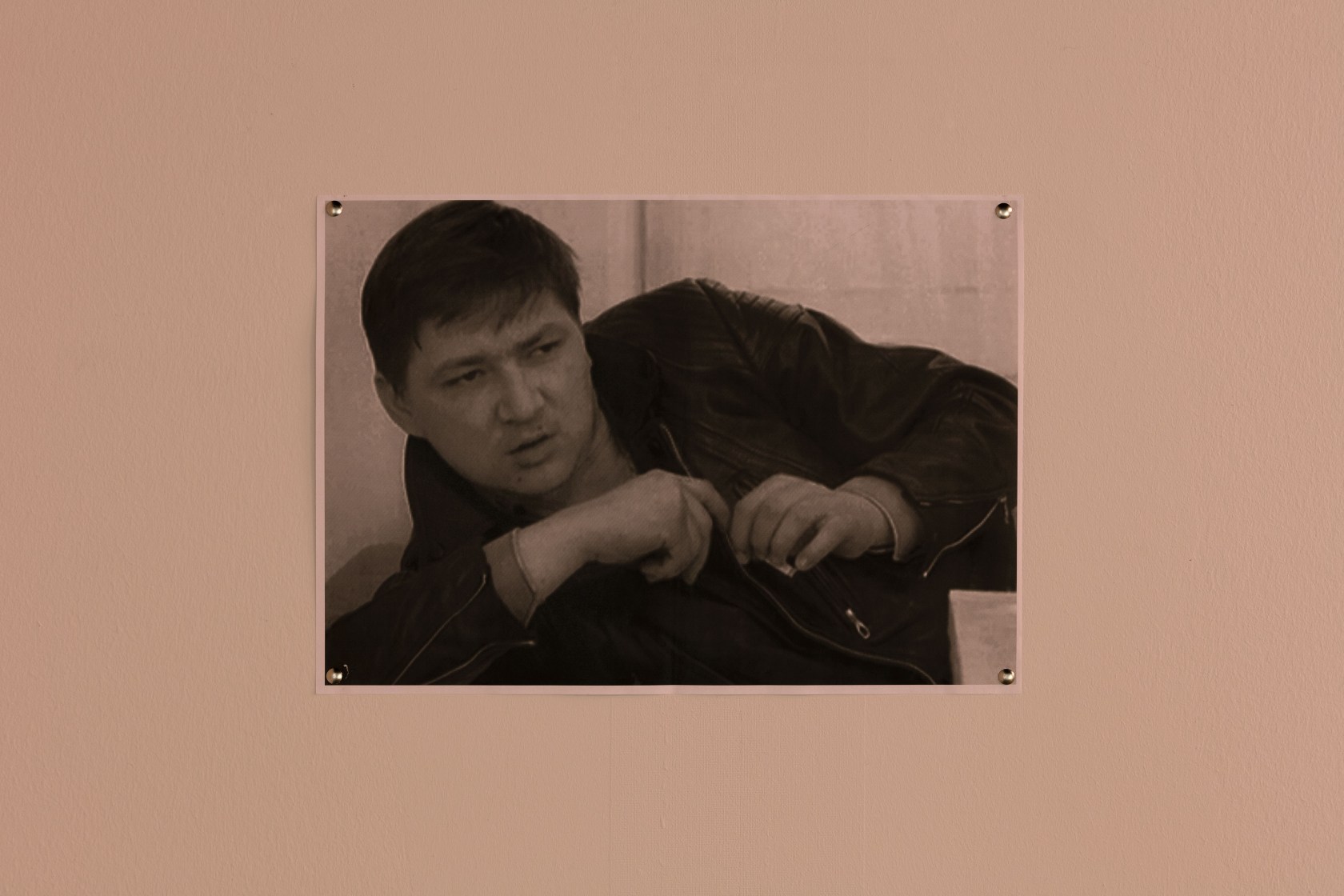 R.W.F. (Rainer Werner Fassbinder), 1993 Installation of bed, cushions, chair, carpet, wall paint, and reflective appliqué, photocopied image of Rainer...