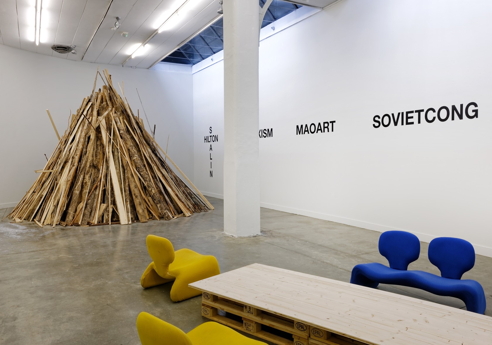 When Do We Need More Tractors? Five Plans, 1999 (left) Wood, vinyl wall text, vodka, glitter, lemon with Philippe Parreno...