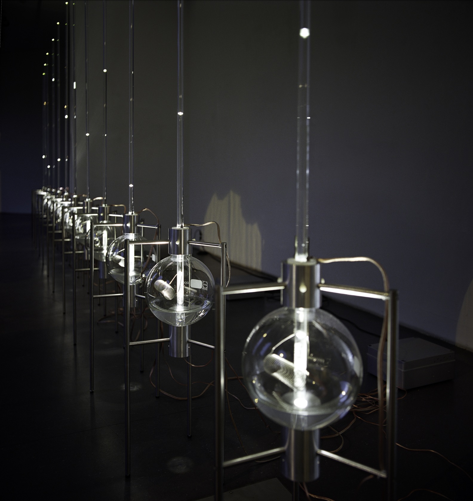 Liquid Diagram, 2009 Distilled water, glass flasks, glass tubes, resistance wire, stainless steel stands, halogen lights, control units, transformers The...