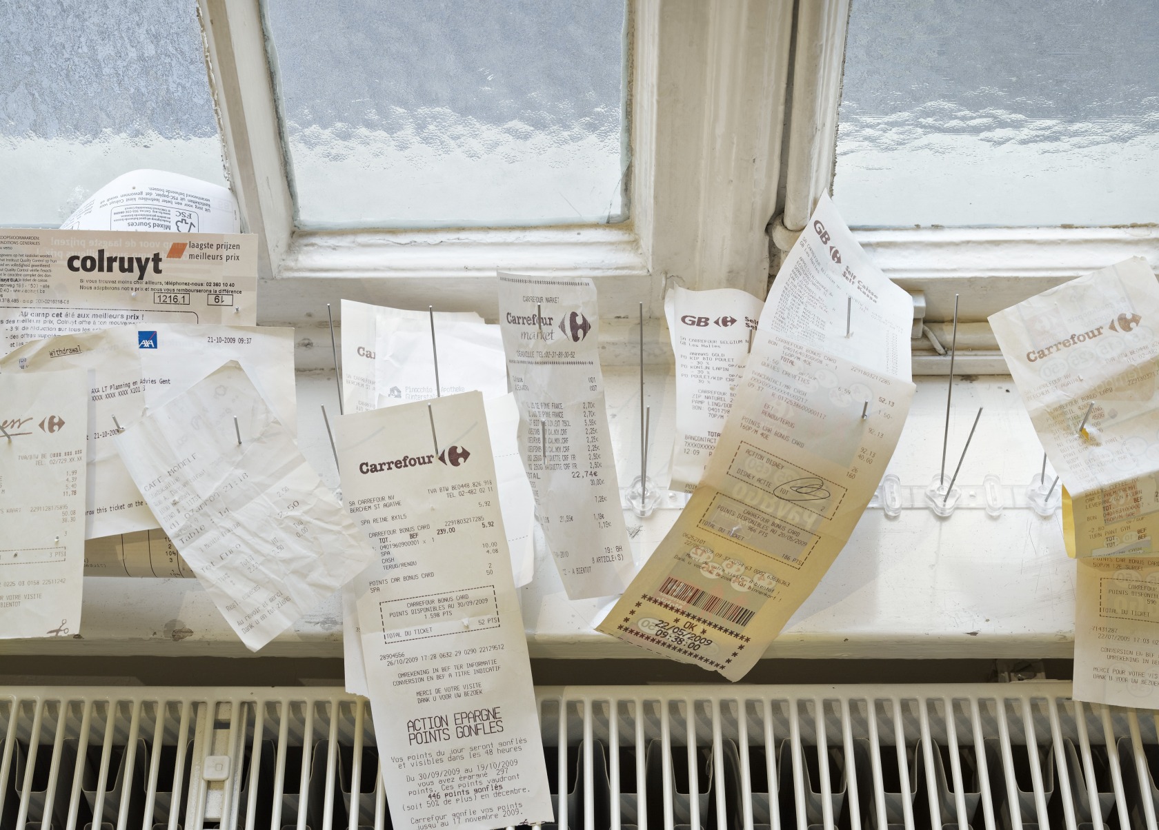 Untitled, 2009–10 Bird spike, collected receipts, sales tickets, bills, vouchers Photo © Phillipp Ottendörfer