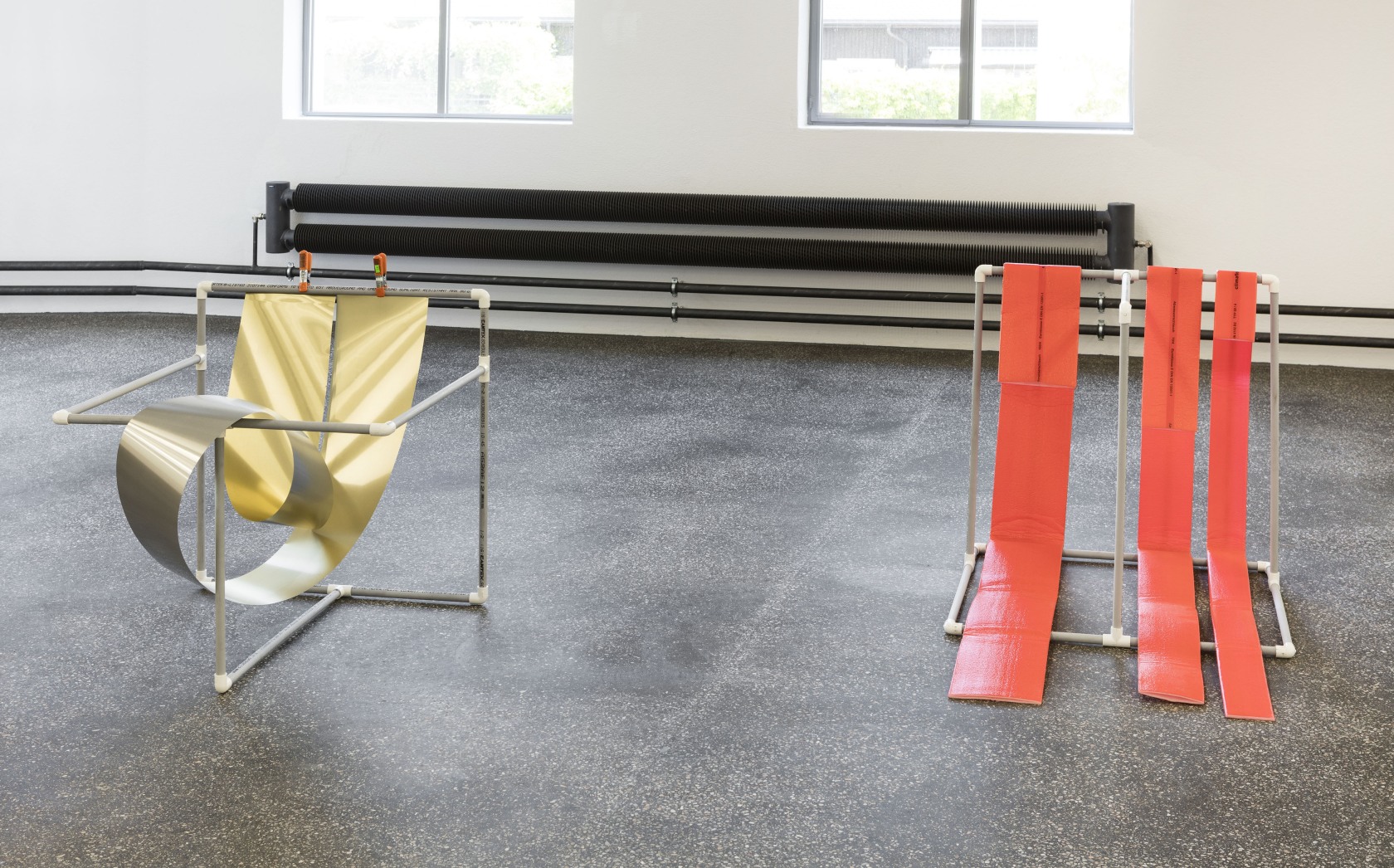 Charted Temperature 2, 2016 (left) Pipes, aluminium sheet Held on an upper horizontal section of pipe at its ends by...