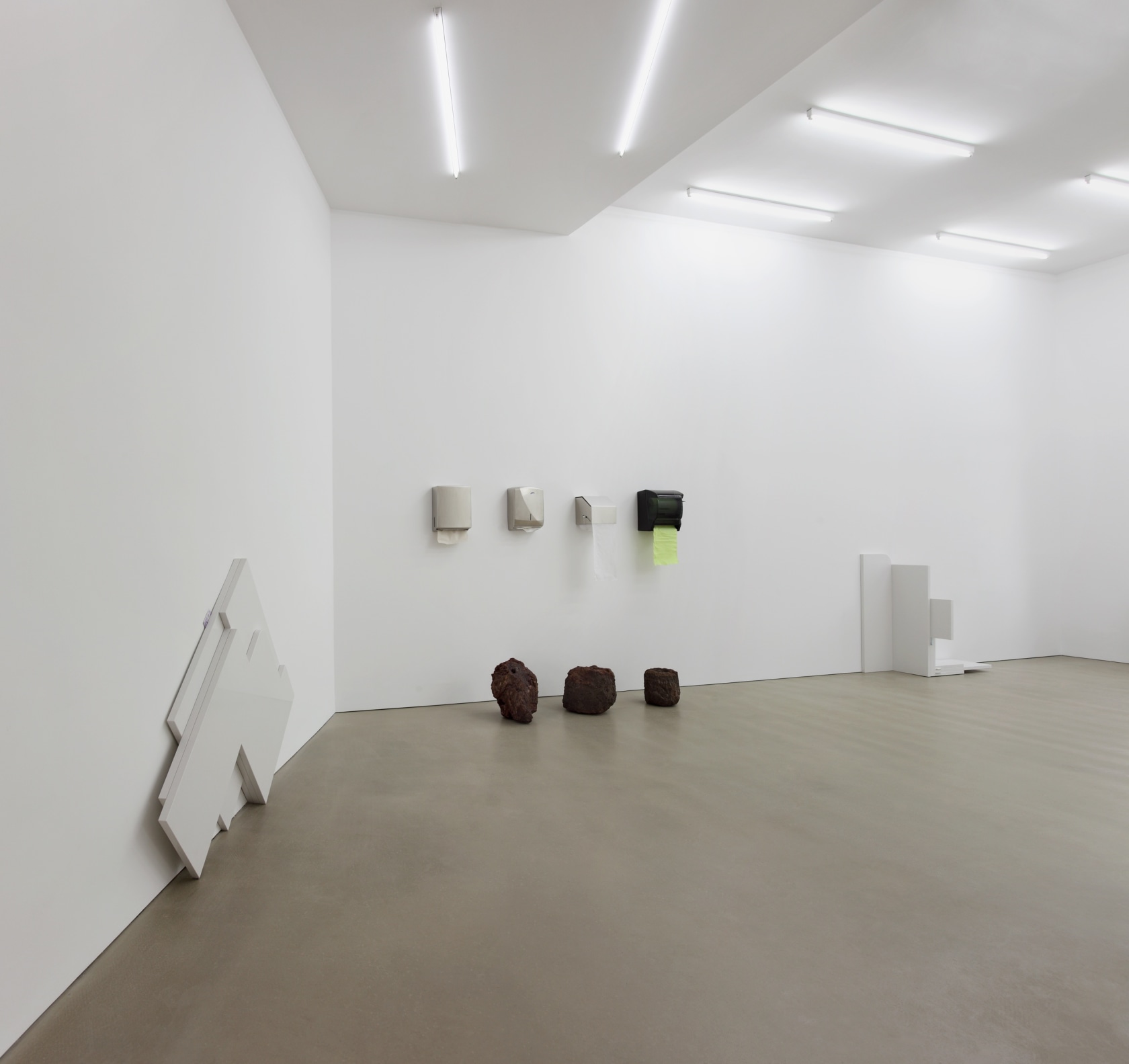 Untitled (CM 02), 2011 (left) Composite marble, bank notes Soft Boxes 1, 2011 (center) 4 Wall mounted paper dispenser, paper,...