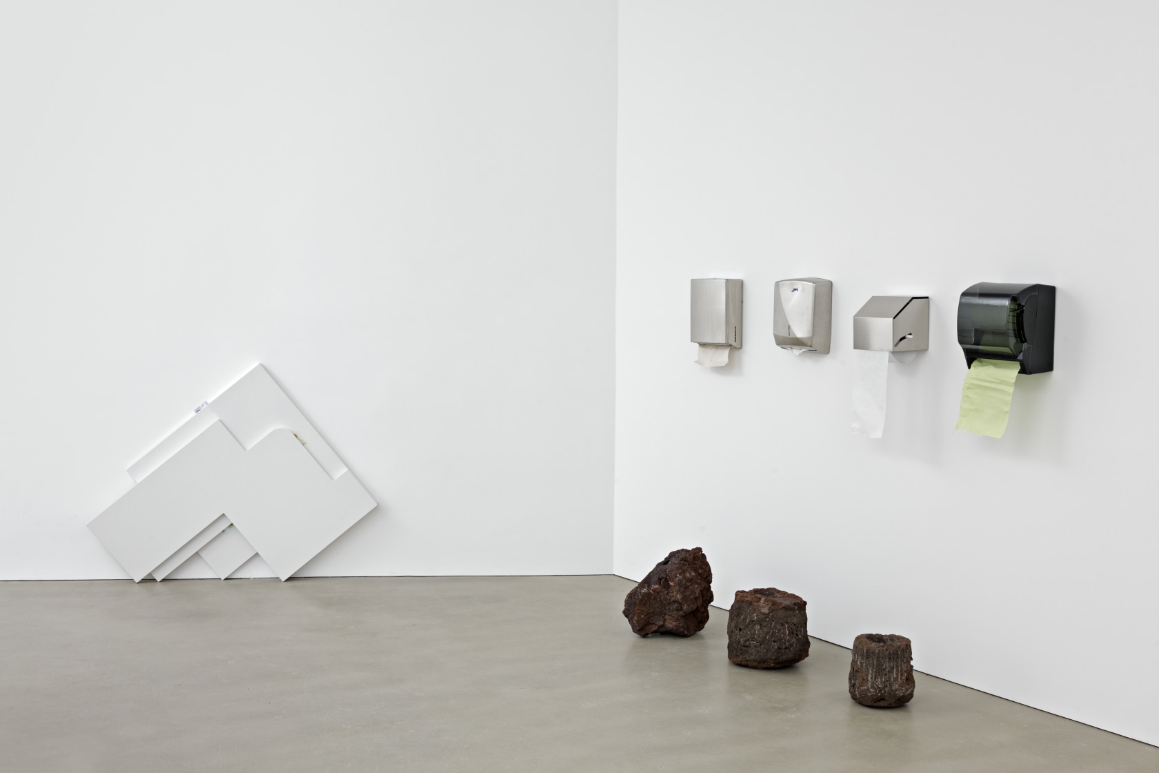 Untitled (CM 02), 2011 (left) Composite marble, bank notes Soft Boxes 1, 2011 (right) 4 Wall mounted paper dispenser, paper,...