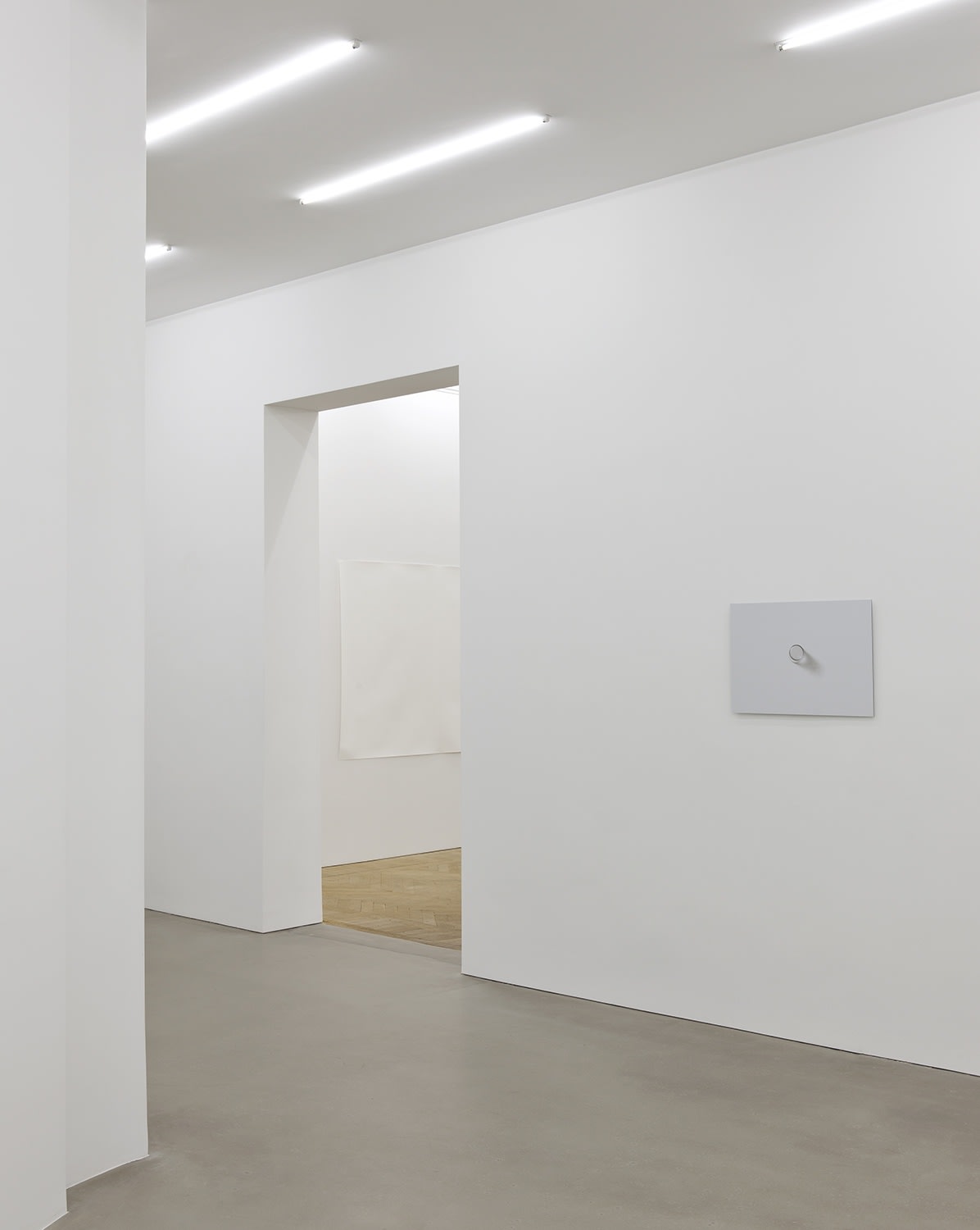 Untitled (Glass), 2011 (foreground) C-print mounted on aluminium dibond The work is installed at 'ear level' on the wall of...