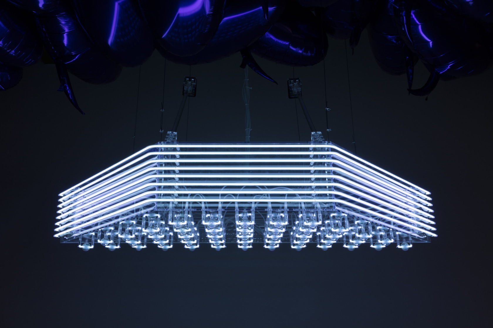 Philippe Parreno Speech Bubbles (Violet) (on the ceiling) 1,500 mylar balloons, mould of balloons, certificate Philippe Parreno Marquee (suspended) Transparent...