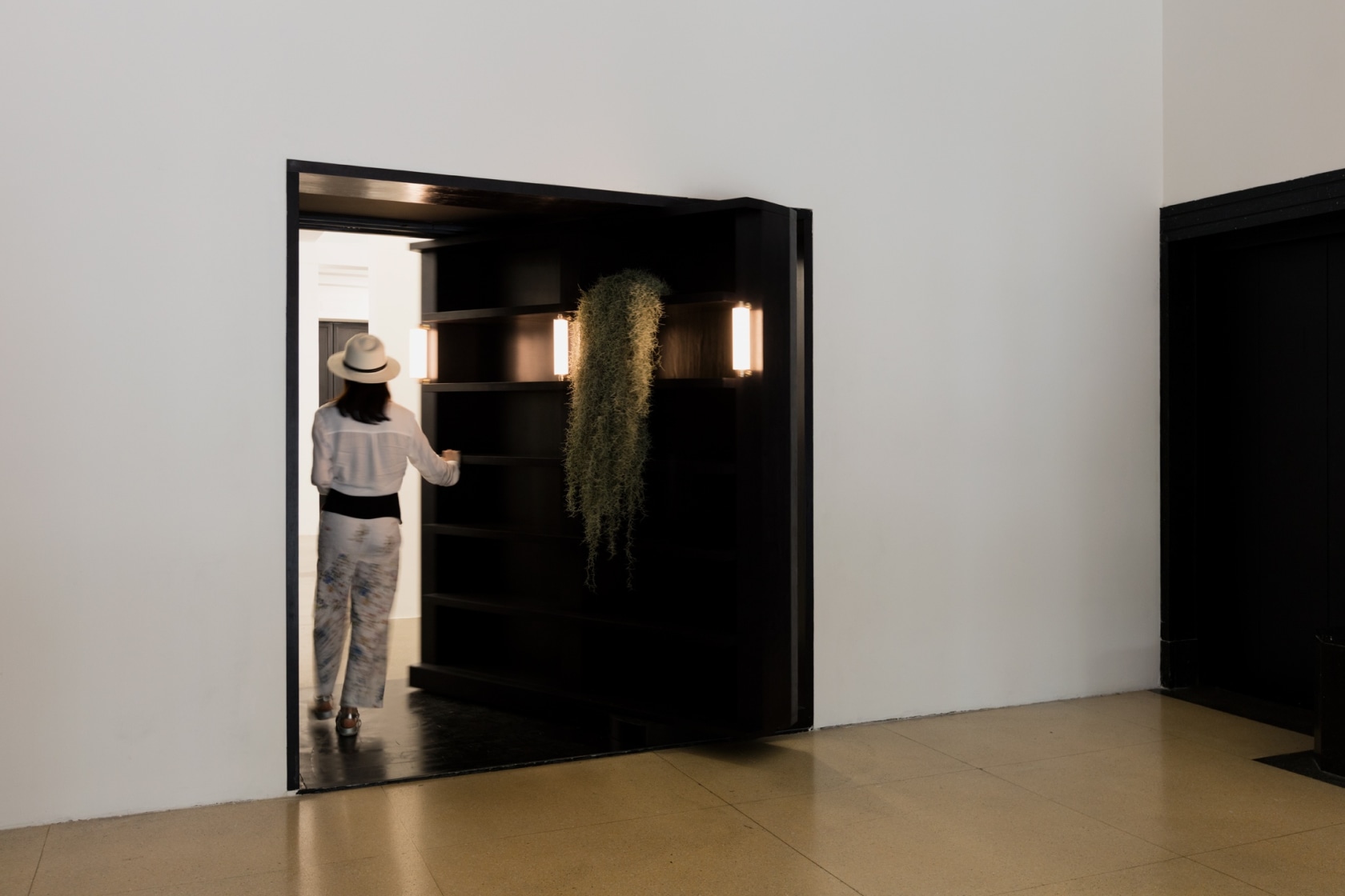 Swinging Library (Rockbund), 2017 Ebony wood, 3 mini modular LED lamps 216 x 205,5 x 36 cm Photo © Andrea...