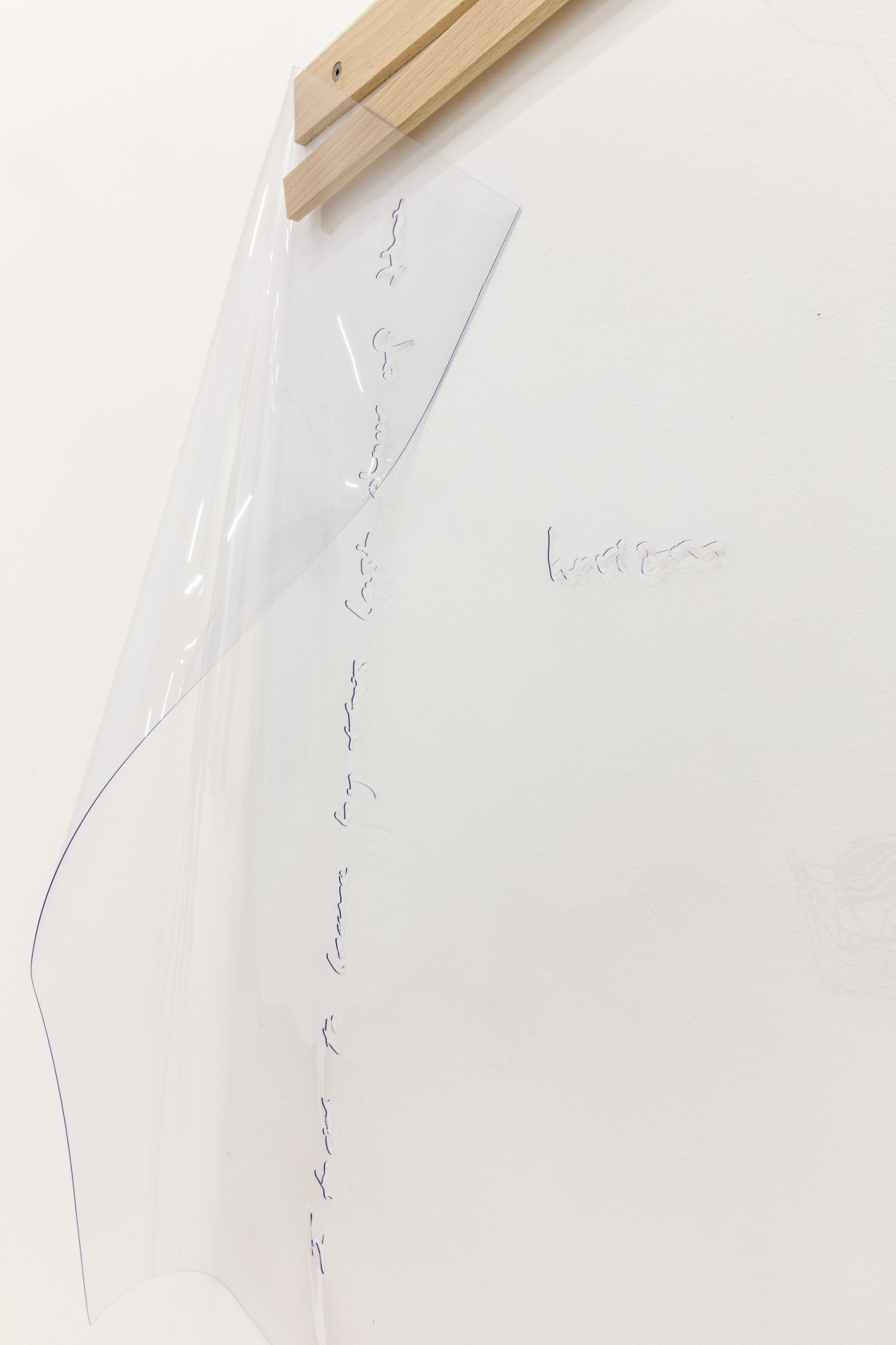 replaced by words (horizon), 2017 Soft PVC foil, Plexiglas, wood The work evokes a concrete phenomenon (the horizon line), the...