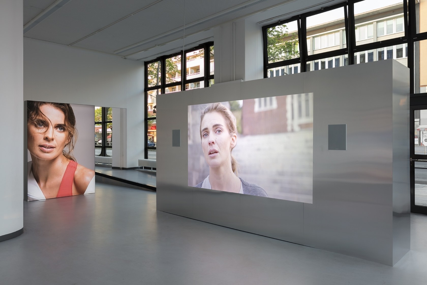 Simon Fujiwara Joanne, 2016/18 Three free-standing aluminium structures: one with in-built LED monitors screening video, with digital print on foil...