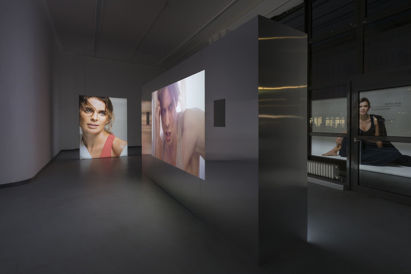 Simon Fujiwara Joanne, 2016/18 Three free-standing aluminium structures: one with in-built LED monitors screening video, with digital print on foil...