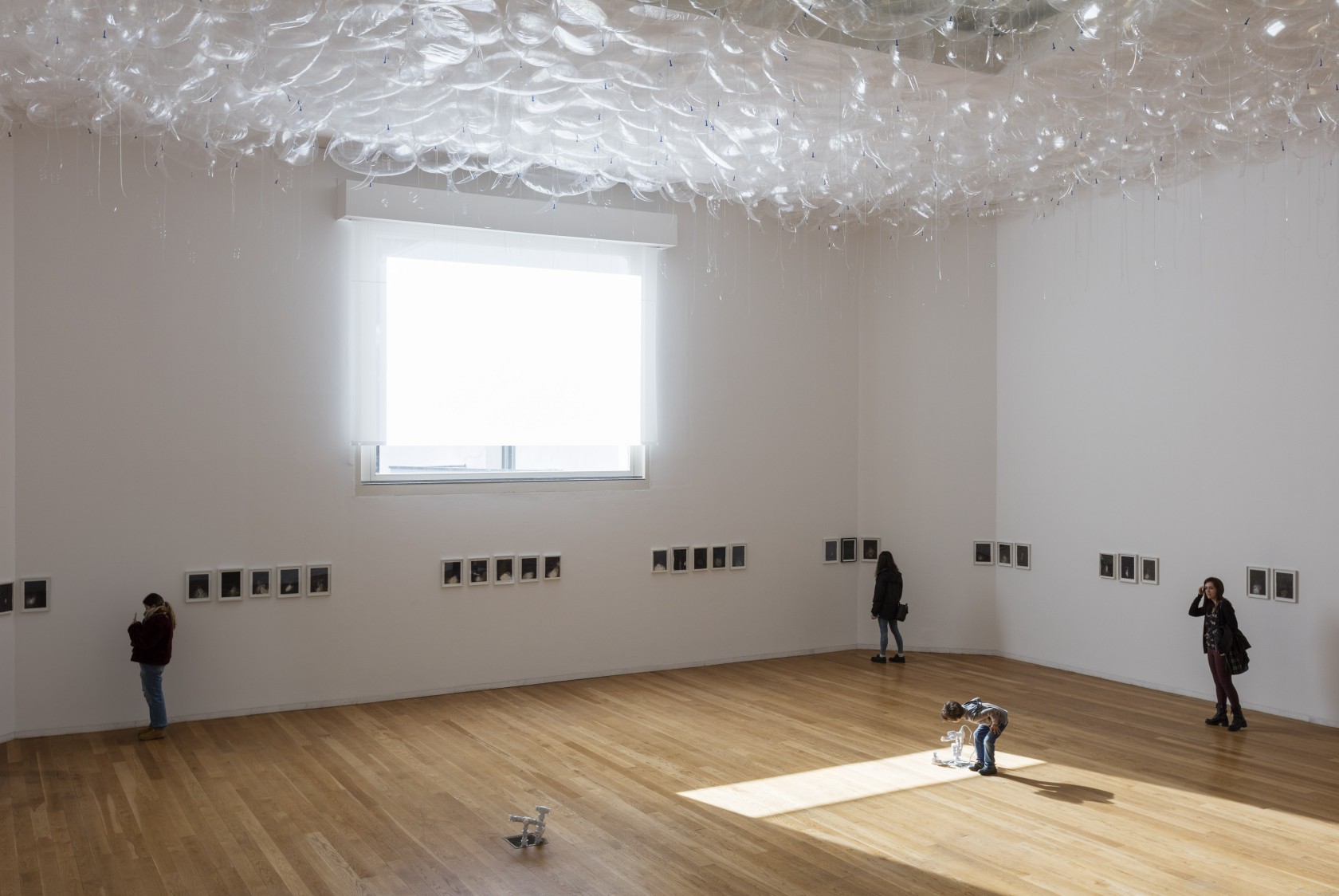 From above: Speech Bubbles (Transparent), 2017 Mylar ballons, helium Fireflies, 2012-16 Ink on paper Dimensions variable Various private collections AC/DC...