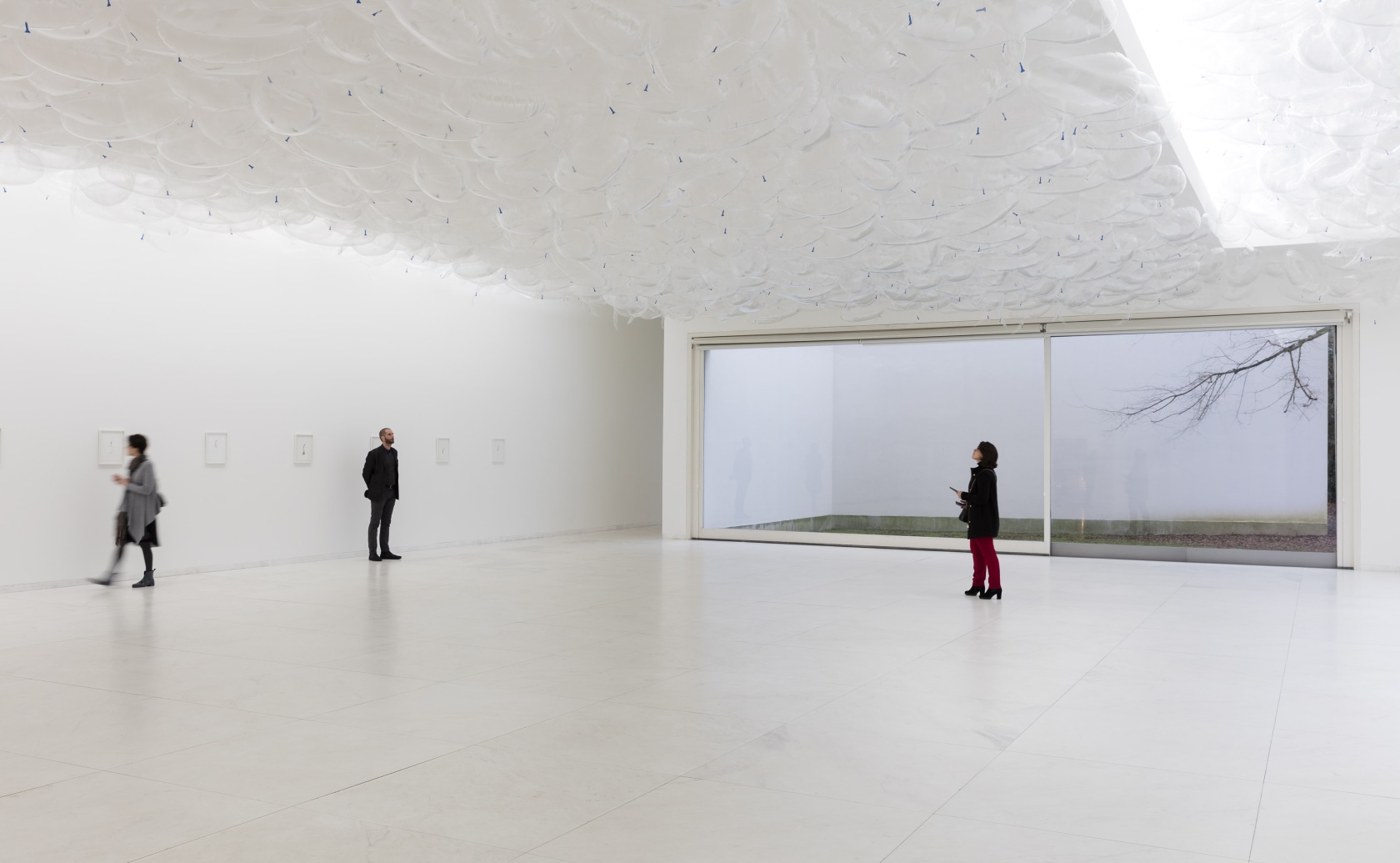 From above: Speech Bubbles (Transparent), 2017 Mylar balloons, helium On the walls: Fireflies, 2012-16 Ink on paper Dimensions variable Various...