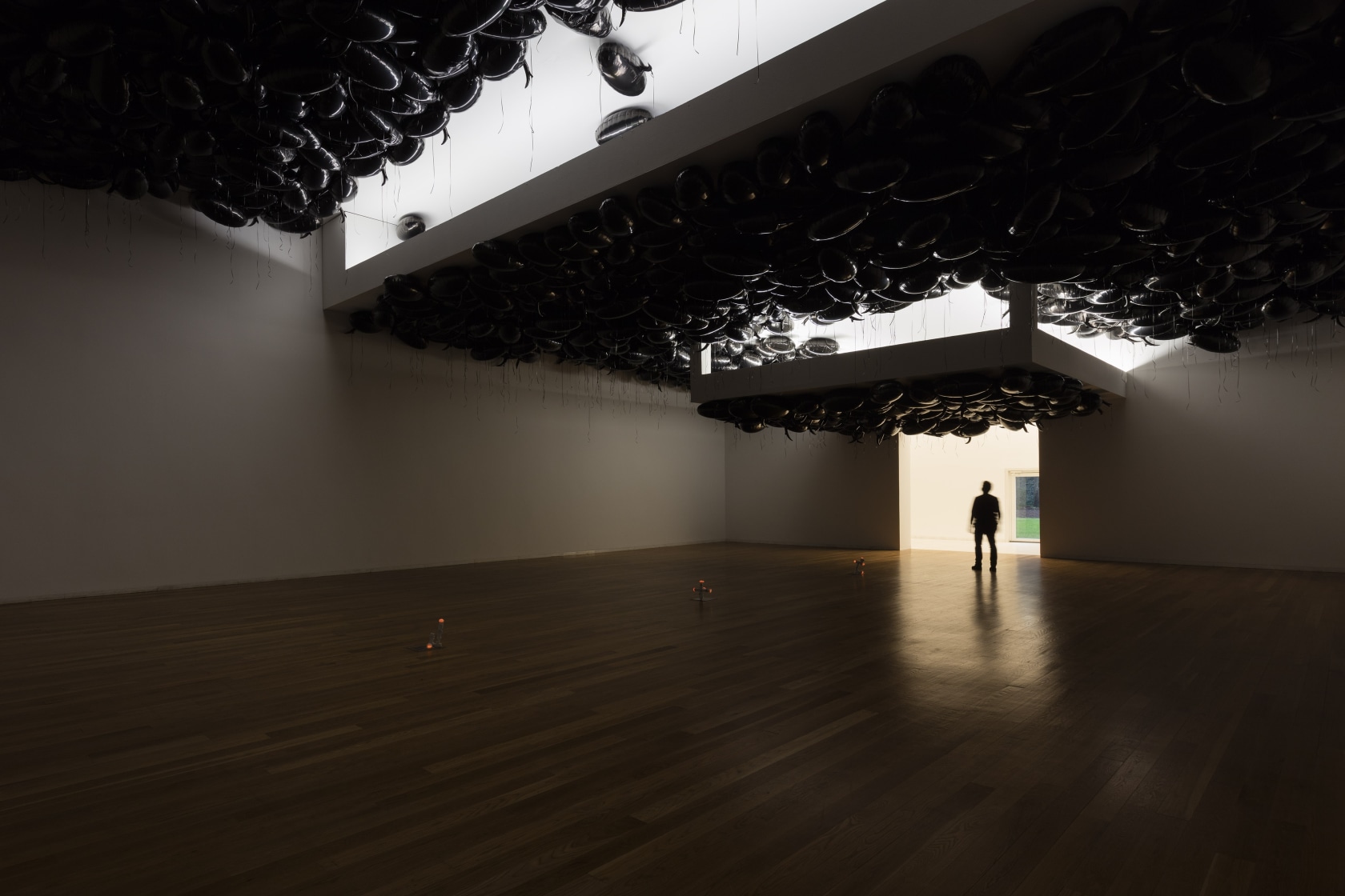 From above: Speech Bubbles (Black), 2007 Mylar balloons, helium Collections Fondation Louis Vuitton, Paris AC/DC Snakes, 1995-2010 Electrical plugs and...