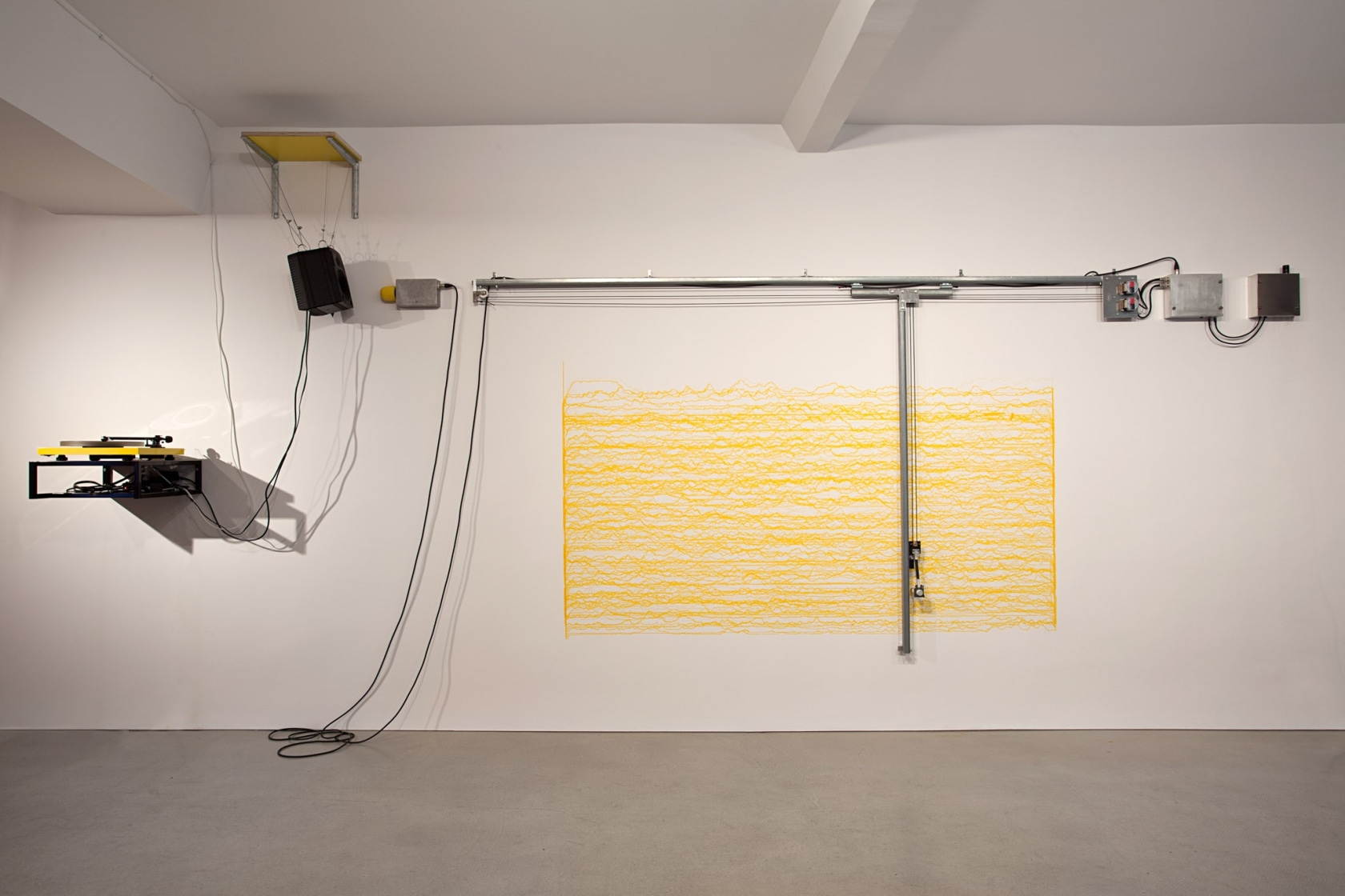 Short Big Yellow Drawing Machine, 2012 Drawing Machine, ink (yellow), wall mounted table, MP3 player or yellow record player, ABCDLP...