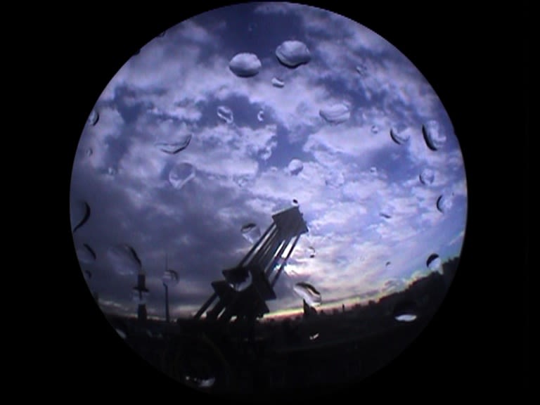 Cloudbuster Project / Heaven and Sky, 2003 Installation with satellite bowl, beamer projection, cloudbuster, video camera, monitor, water Pump, water...