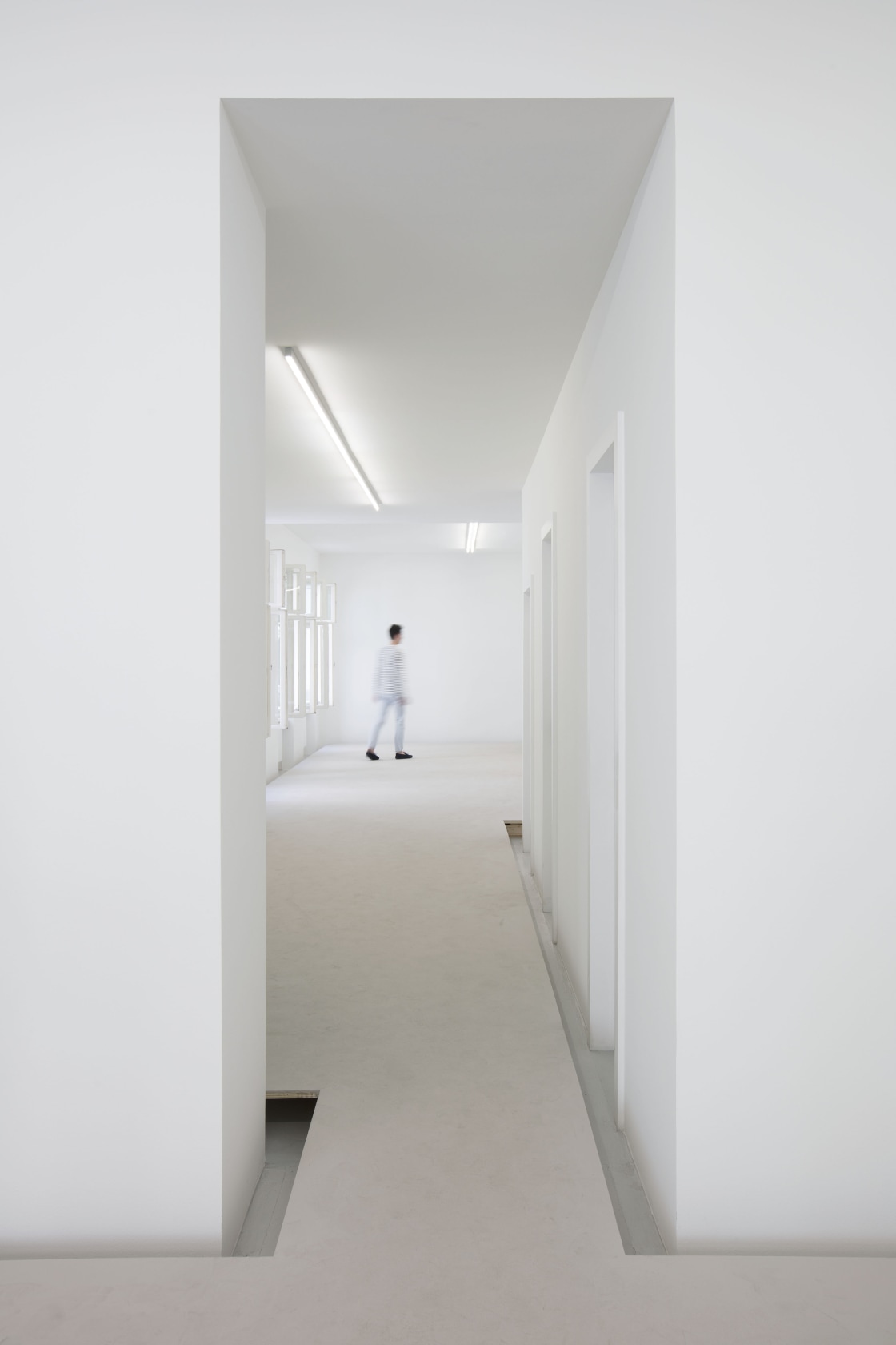 Floor, 1991/2016 Wood, concrete A second floor, built 15 cm above the actual floor of the gallery, raises visitors slightly...