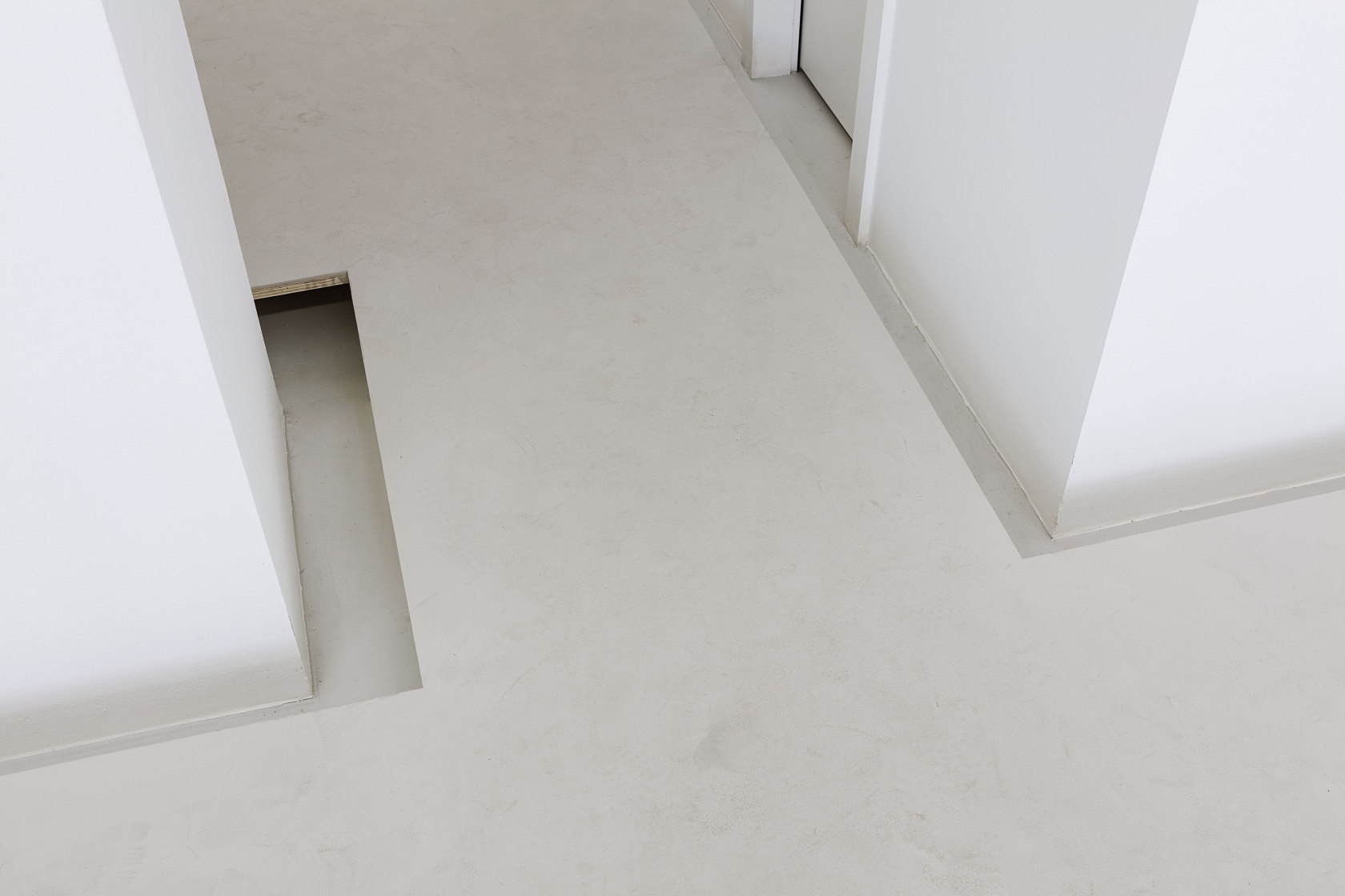 Floor, 1991/2016 Wood, concrete A second floor, built 15 cm above the actual floor of the gallery, raises visitors slightly...