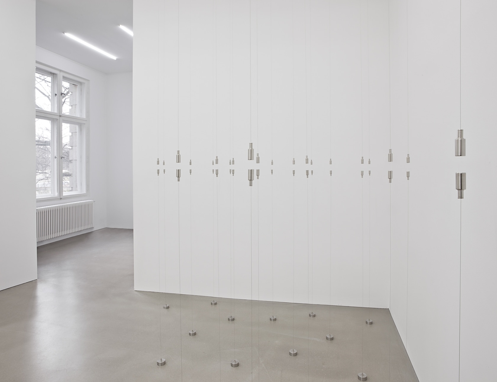 Plane, 2013 Magnets, stainless steel weights, stainless steel wire, fixtures Photo © Andrea Rossetti