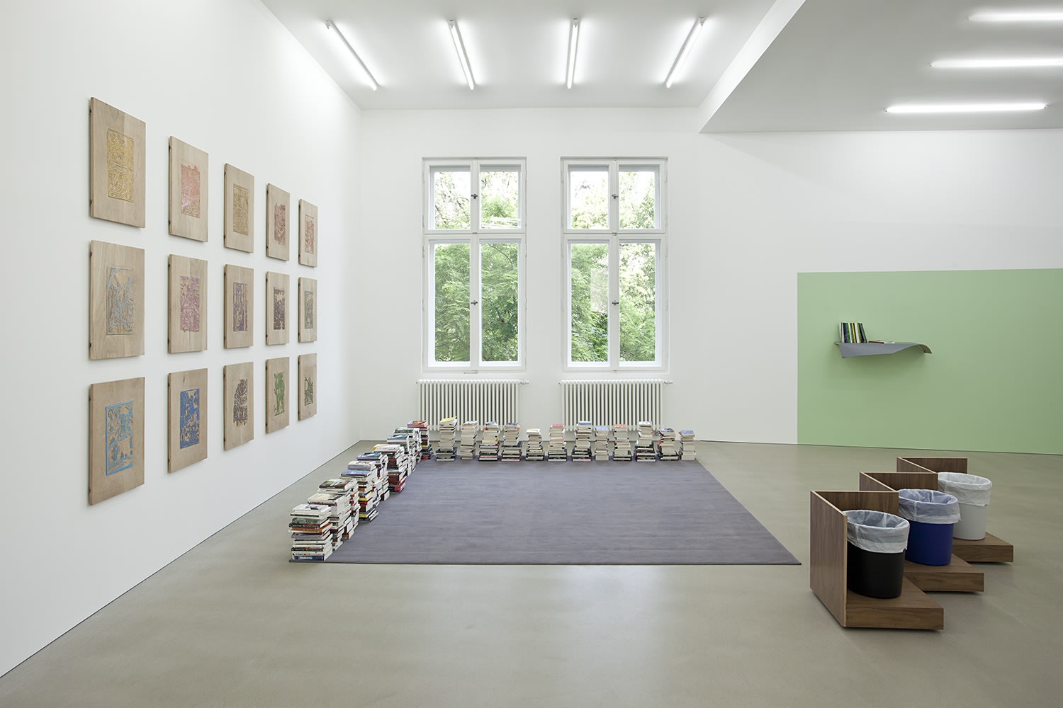 Liam Gillick Pourquoi Travailler?, 2012 (left) 15 wooden boards 59 x 39.5 cm (each) Dominique Gonzalez-Foerster 2058 (Bibliography), 2012 (center...