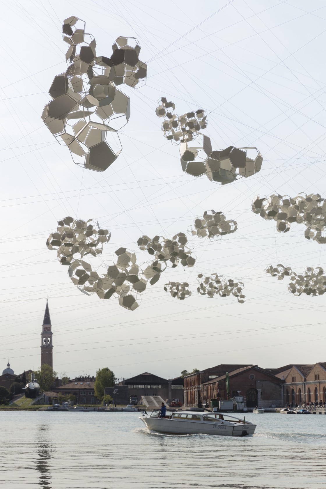 On the disappearance of clouds, 2019 Powder coated stainless steel, white panels, stainless steel cable, anchoring points (variable, 21 for...