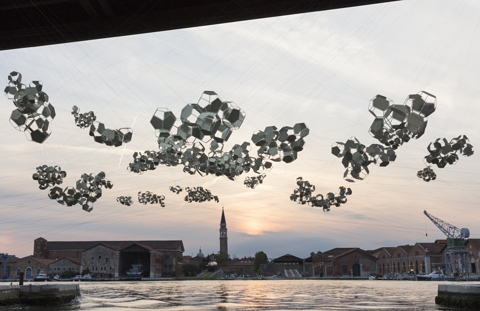 On the disappearance of clouds, 2019 Powder coated stainless steel, white panels, stainless steel cable, anchoring points (variable, 21 for...