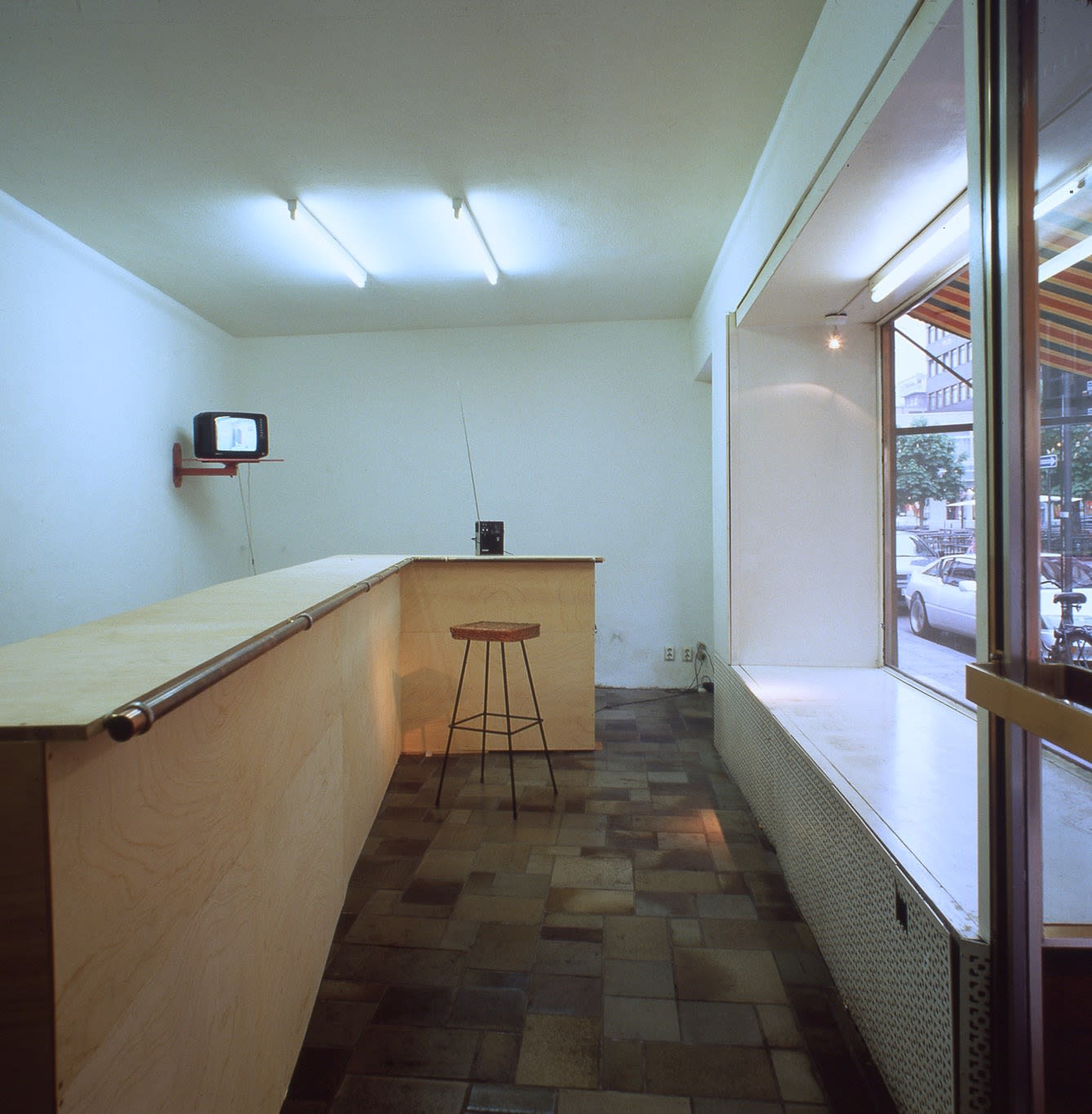 Exhibition view: Rirkrit Tiravanija, Untitled - Angst Essen Seele auf, Schipper & Krome, Cologne, 1994. Photo &copy; Lothar Schnepf