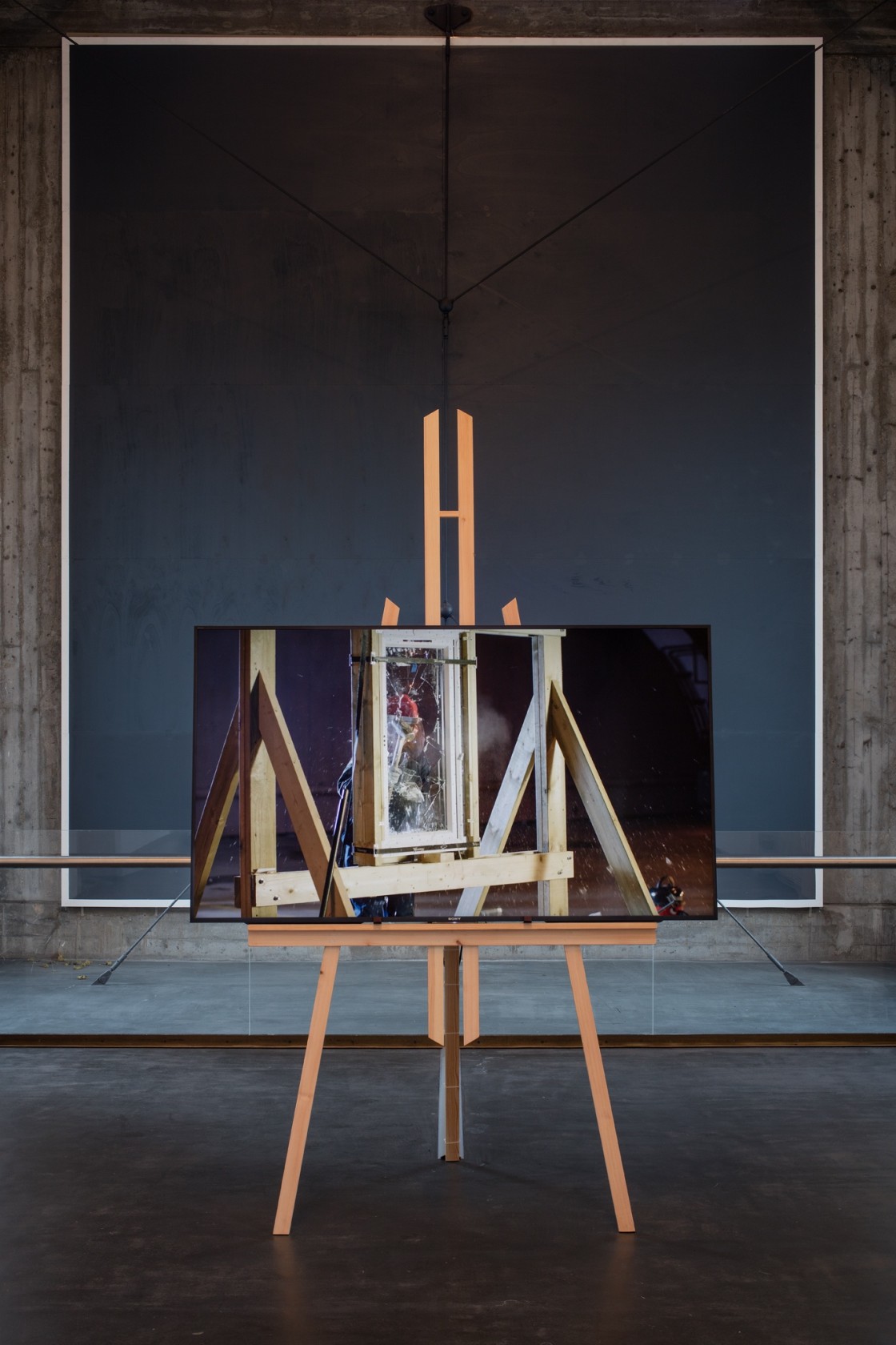 The City of Broken Windows, 2018 Two-channel video (HD, colour, sound), wooden easels, vinyl sticker, panel painting (environment) Variable dimensions...