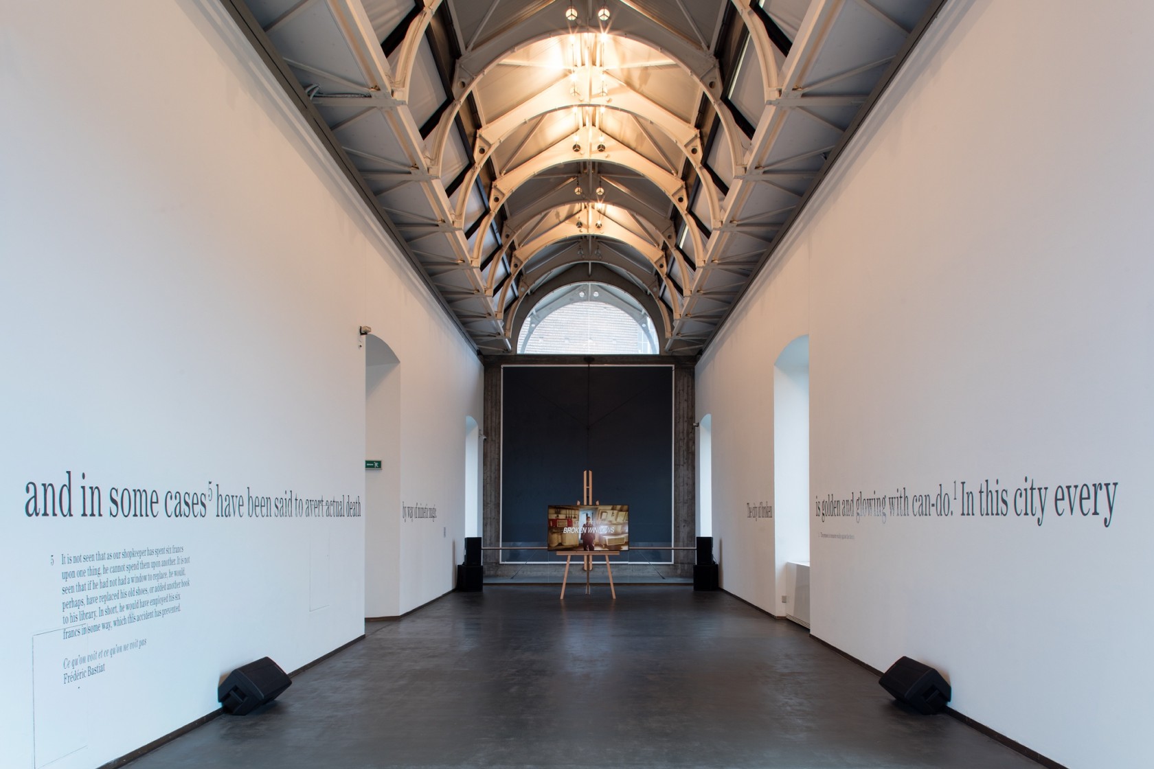 The City of Broken Windows, 2018 Two-channel video (HD, colour, sound), wooden easels, vinyl sticker, panel painting (environment) Variable dimensions...