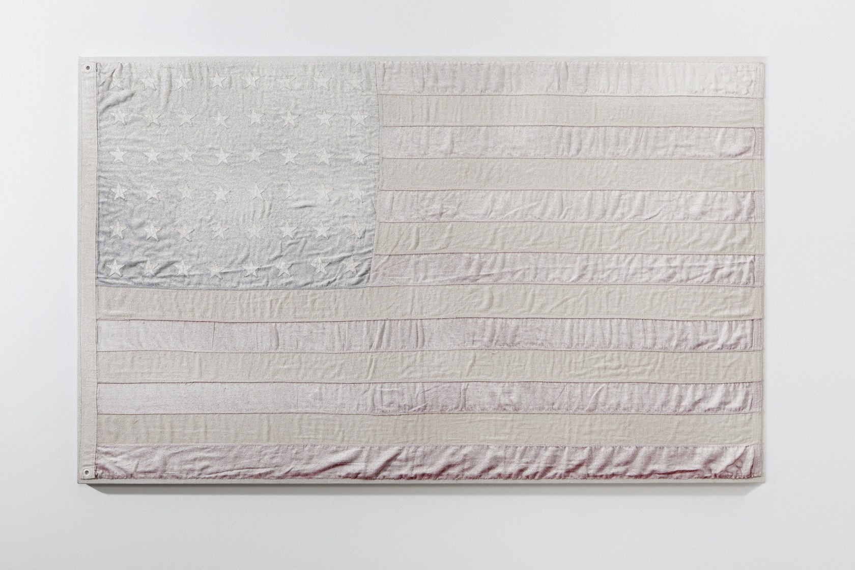 White Flag #2, 2015 Rabbit skin glue, Champagne chalk, raw honey on wool, cotton and metal grommet on linen Formally,...