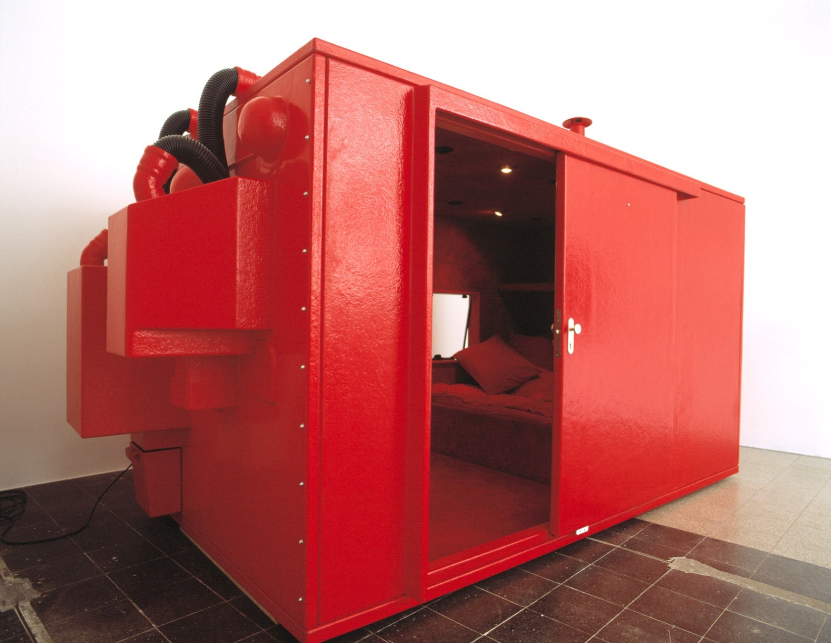 Joep van Lieshout, Maxi Capsule Luxus, 2002. Exhibition view: AREA, Schipper & Krome, Berlin, 2002. Photo © Howard Sheronas