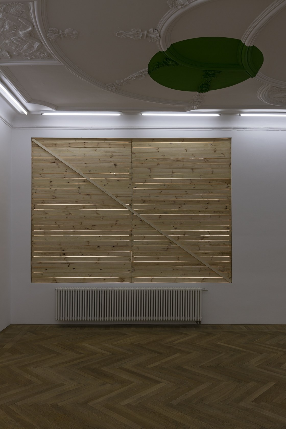 41°03’59.1”N 8°57’27.9”E, 2016 (ceiling) Latex paint (ChromakeyGreen 1030) The shapes of the wall paintings are based on a window in...