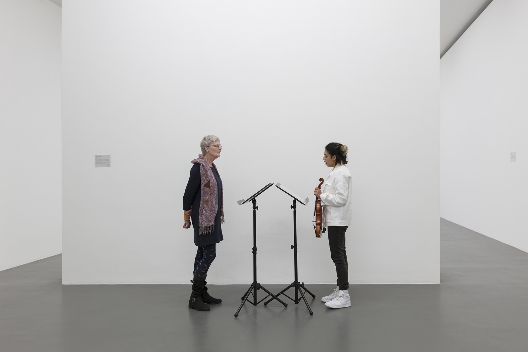 Ari Benjamin Meyers, Duet, 2014, 2 scores on paper, 2 music stands, pdf file, instructions. Exhibition view: Kunsthalle for Music,...