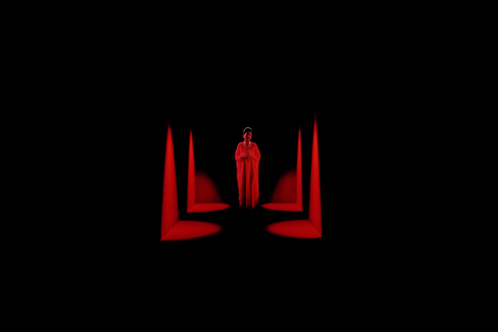 Dominique Gonzalez-Foerster OPERA (QM.15), 2016 HD video 8’05’’, projector, screens, media player, amplifier, speakers, lights, curtains Minimum screening surface 1500...