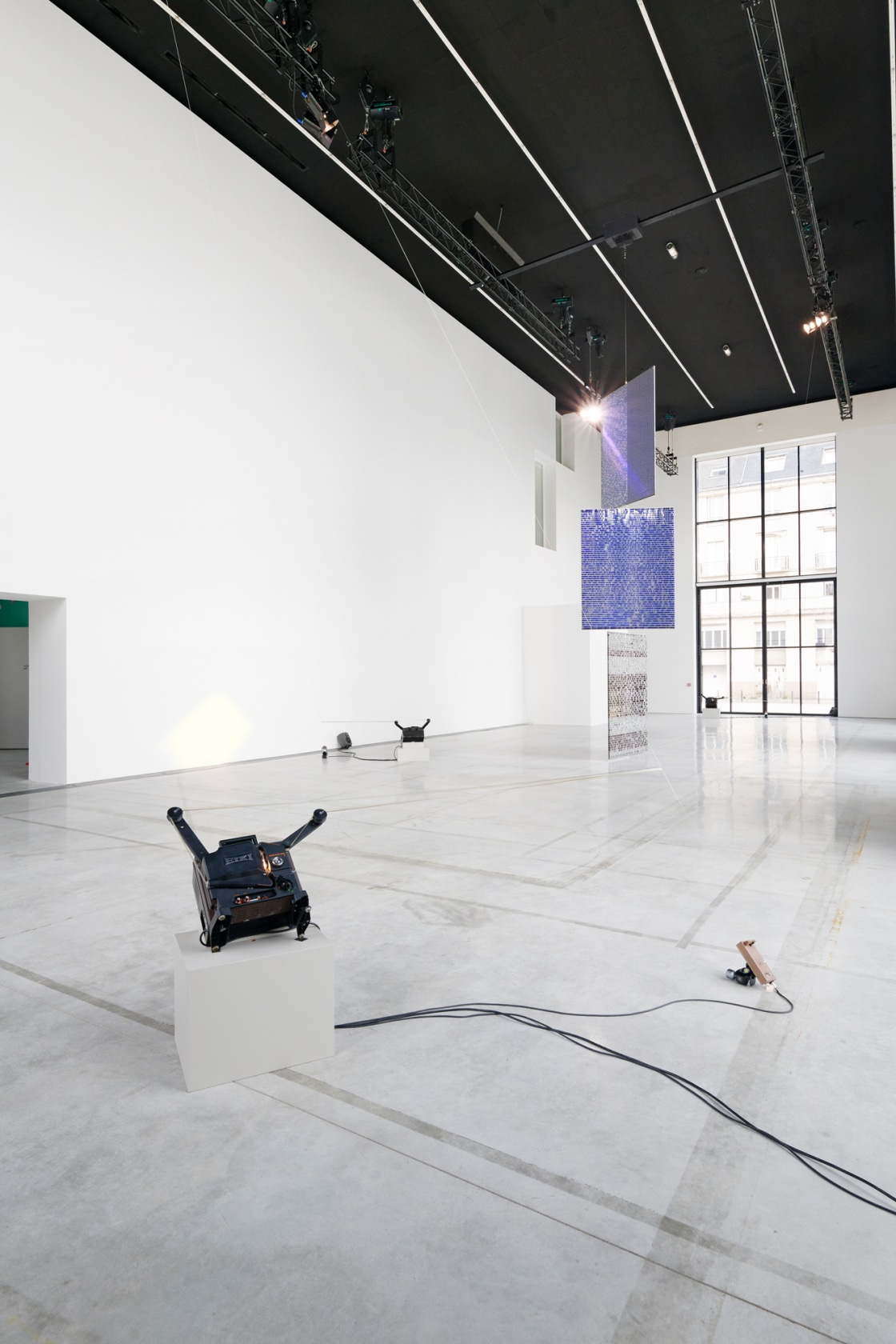 Two works with projectors: Rosa Barba, Wirepiece, 2022. Hanging: Rosa Barba, Weavers, 2022. Exhibition view: Weavers, CCC OD – centre...