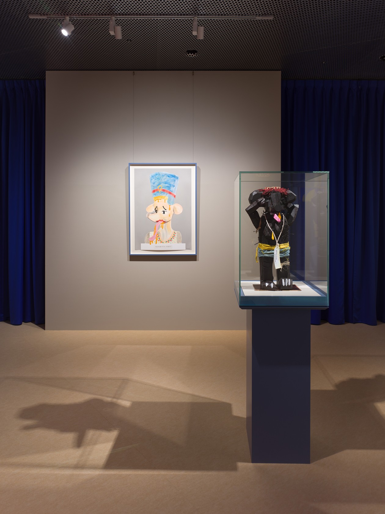 From left to right: Simon Fujiwara, Who is Nefertiti? (Whoseum of Anthropology Artifact), 2022. Simon Fujiwara, Voodoo Who? (Nailed Votive),...