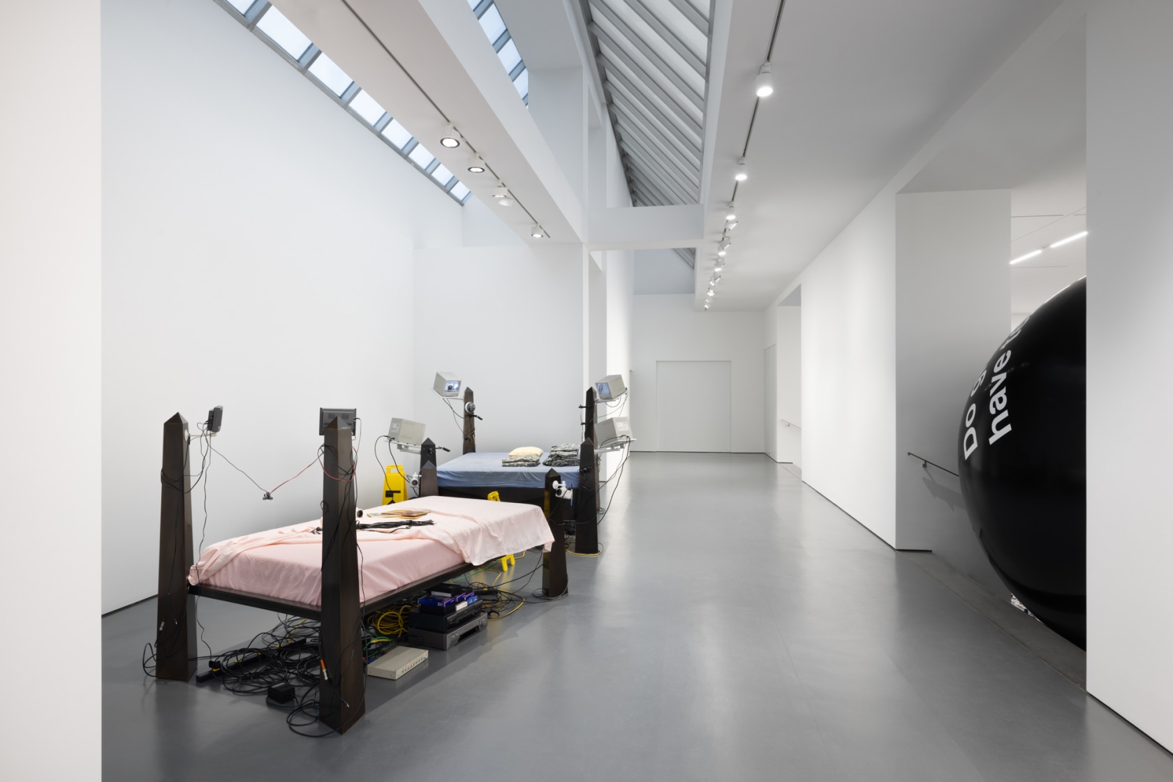 Exhibition view: Julia Scher, Let them know your scarlet heat, let them glisten, Esther Schipper, Berlin 2024. Photo © Andrea...