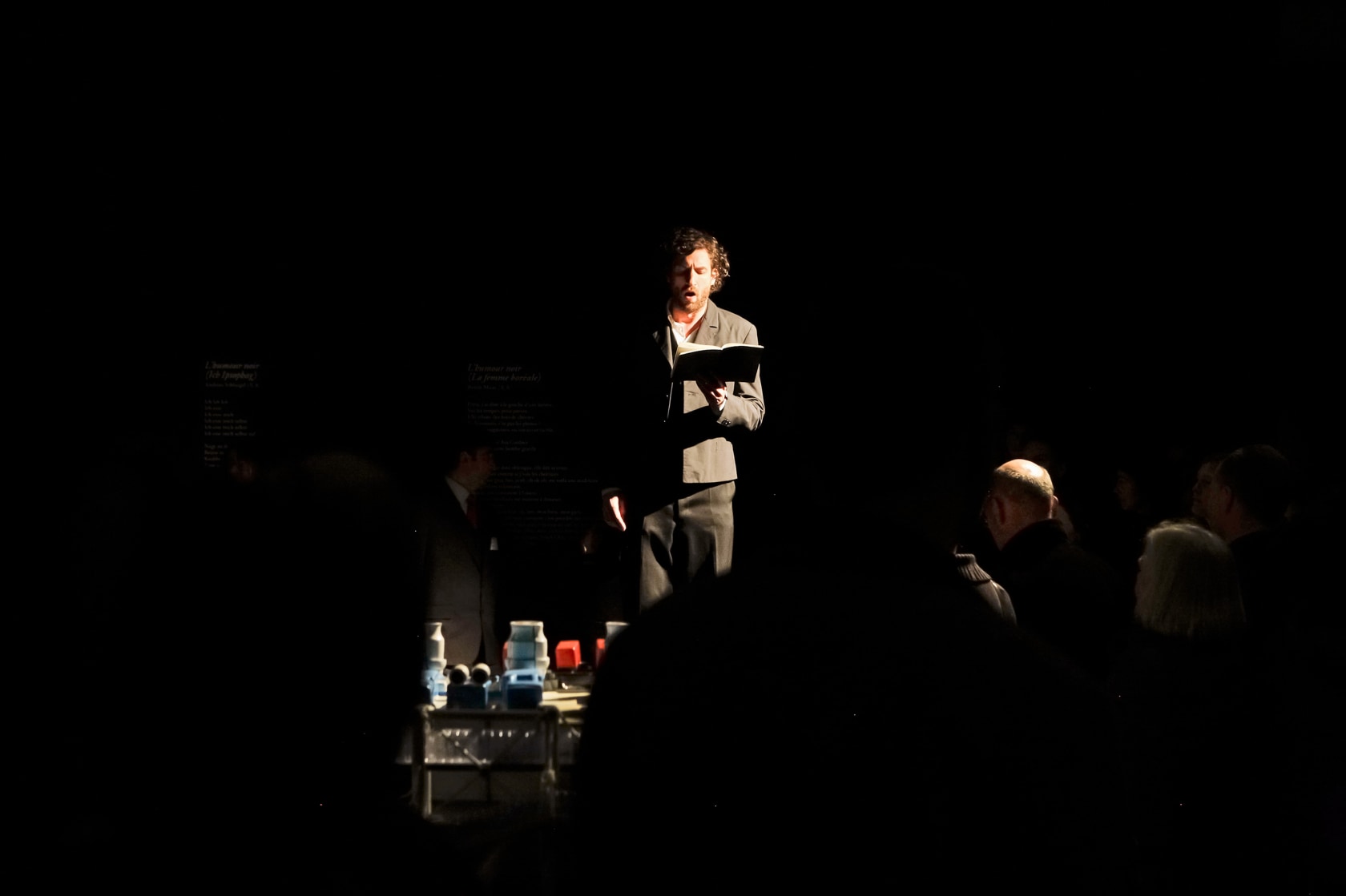 Exhibition view: Saâdane Afif, Anthologie de l’humour noir: A Ceremony, Opening performance: Henrike Jörissen and Sébastien Jacobi declaim the lyrics...