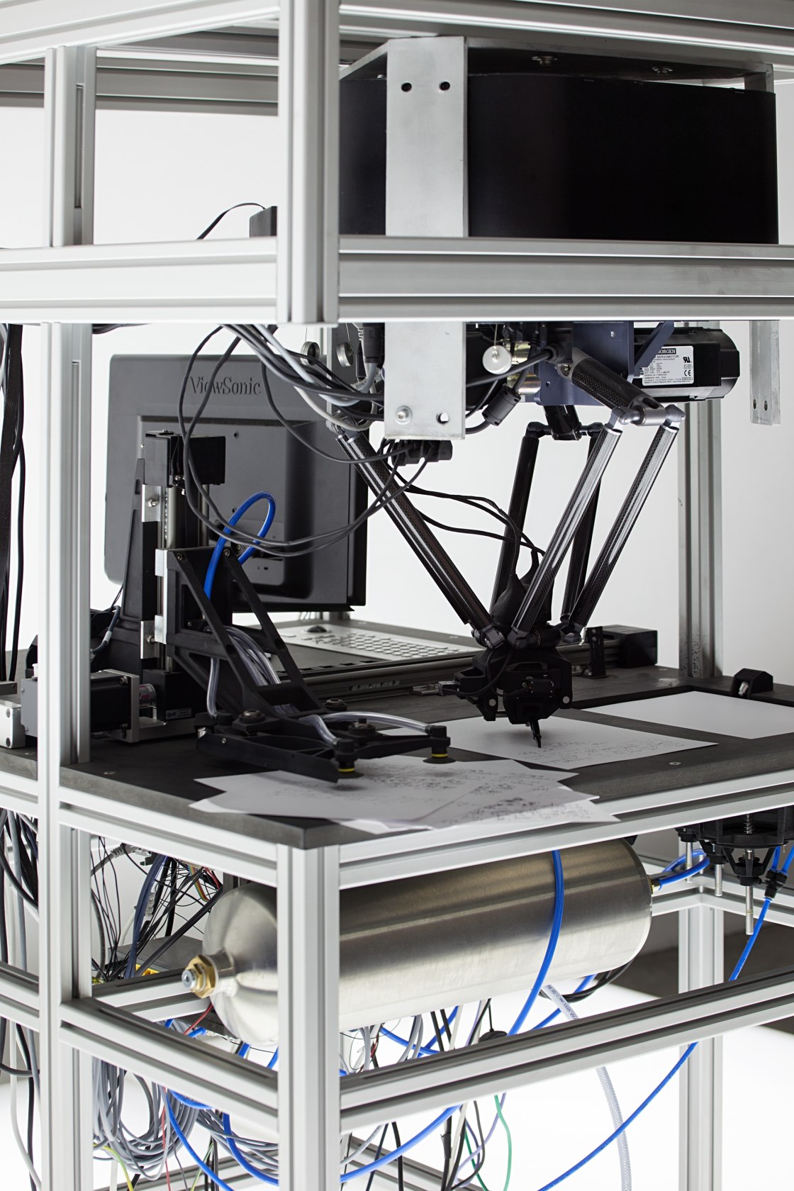 Autograph, 2013 (detail) Modified Dynamic Primitives for Joining Movement Sequences 3 axes robotic arm, paper, pen, air compressor 93 x...