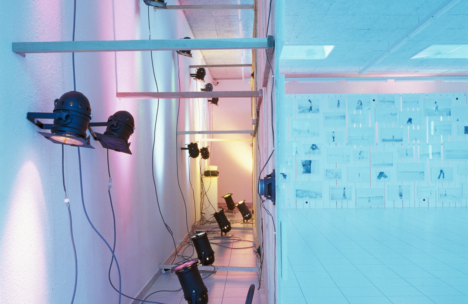 sleep, 1999 (detail) white painted wooden wall, 167 white wooden frames, 167 c-prints, sound, 30 spots + with pvc foils,...