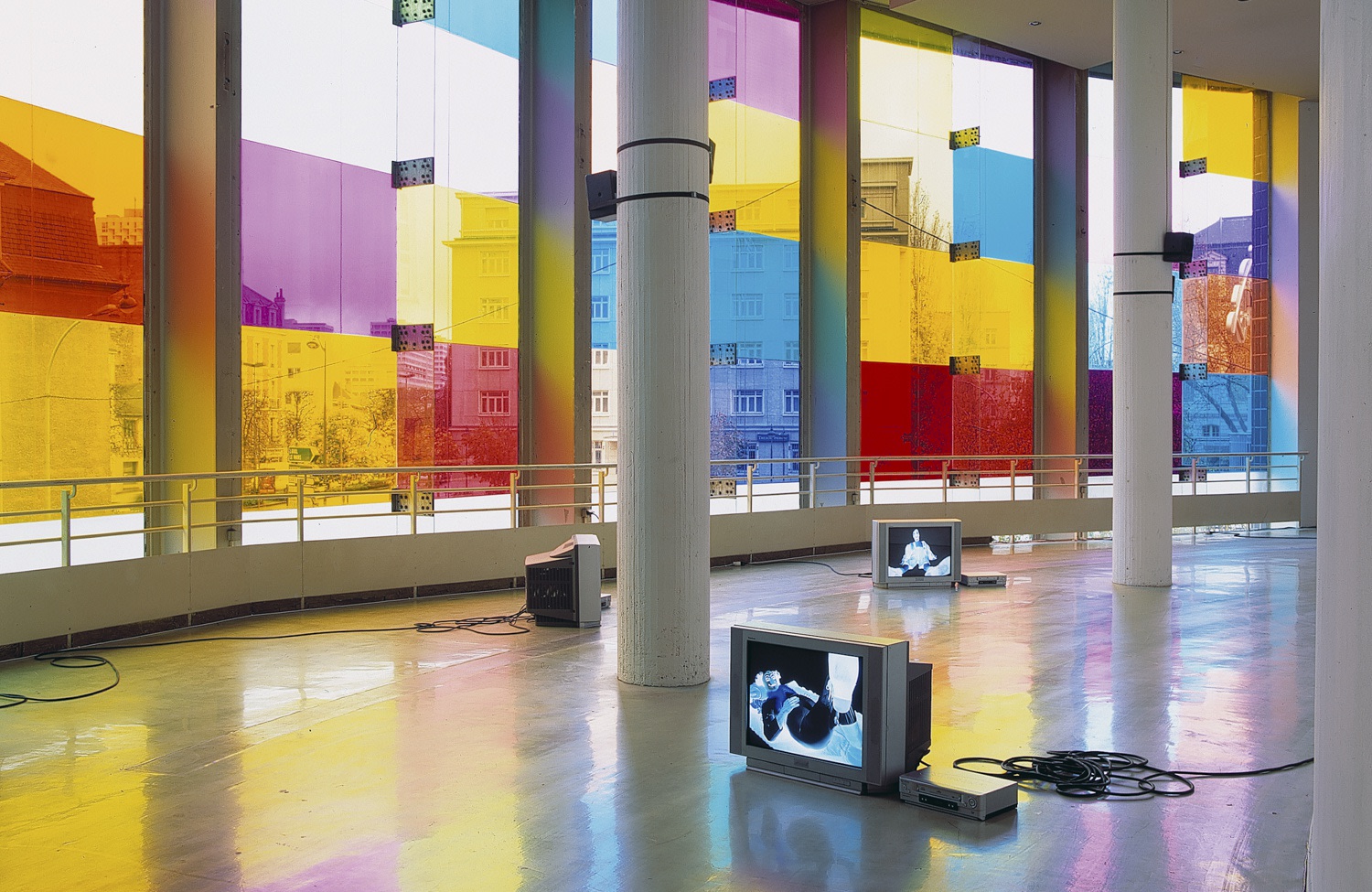 On the window: love invents us, 1999 (detail) Translucent film on window Dimensions variable Front: dog days are over, 1996...