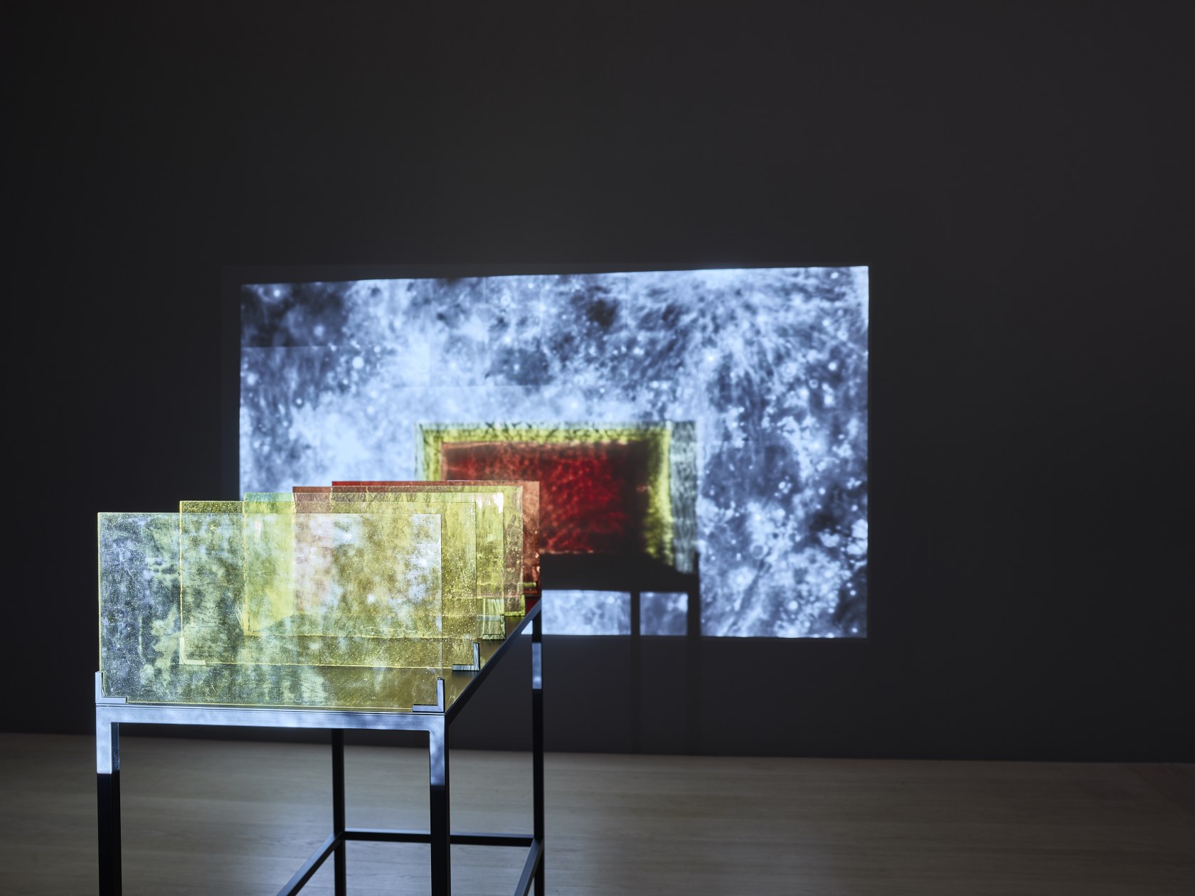 Rosa Barba The Color Out of Space, 2015 HD video (color, sound), 5 colored glass filters, steel base Video duration:...