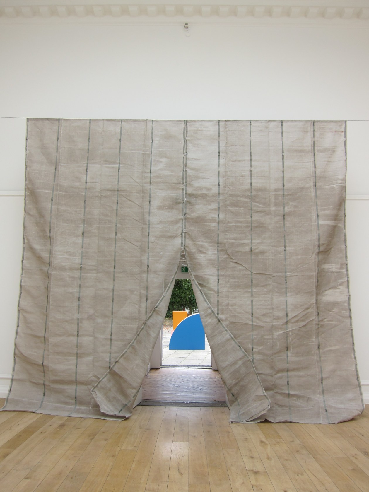 Untitled (100%), 2011 (detail) Painted metal (blue, grey, red, orange), 4 parts Each part represents the quarter of a circle:...