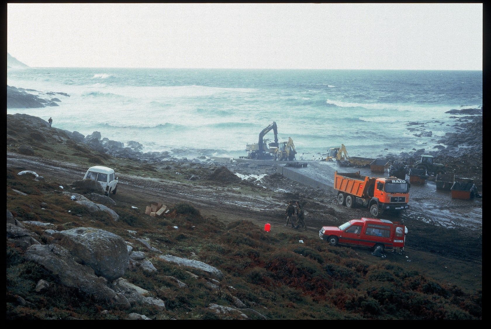 Allan Sekula Percebeiros (shellfishers) working, army preparing (Tourinan, 12/24/02), 2002-2003