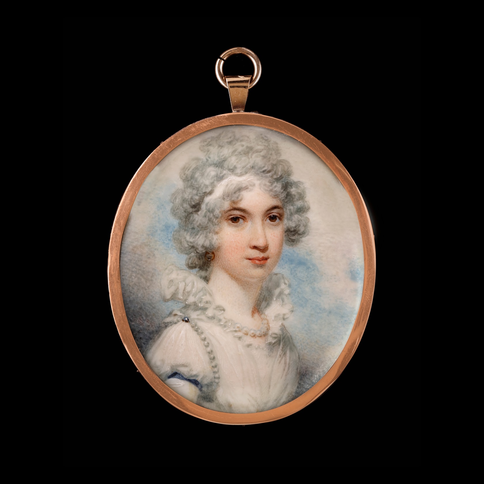 Watercolour on ivory in gold coloured frame the reverse with blue glass Oval, 2 1/4 in (57 mm) high