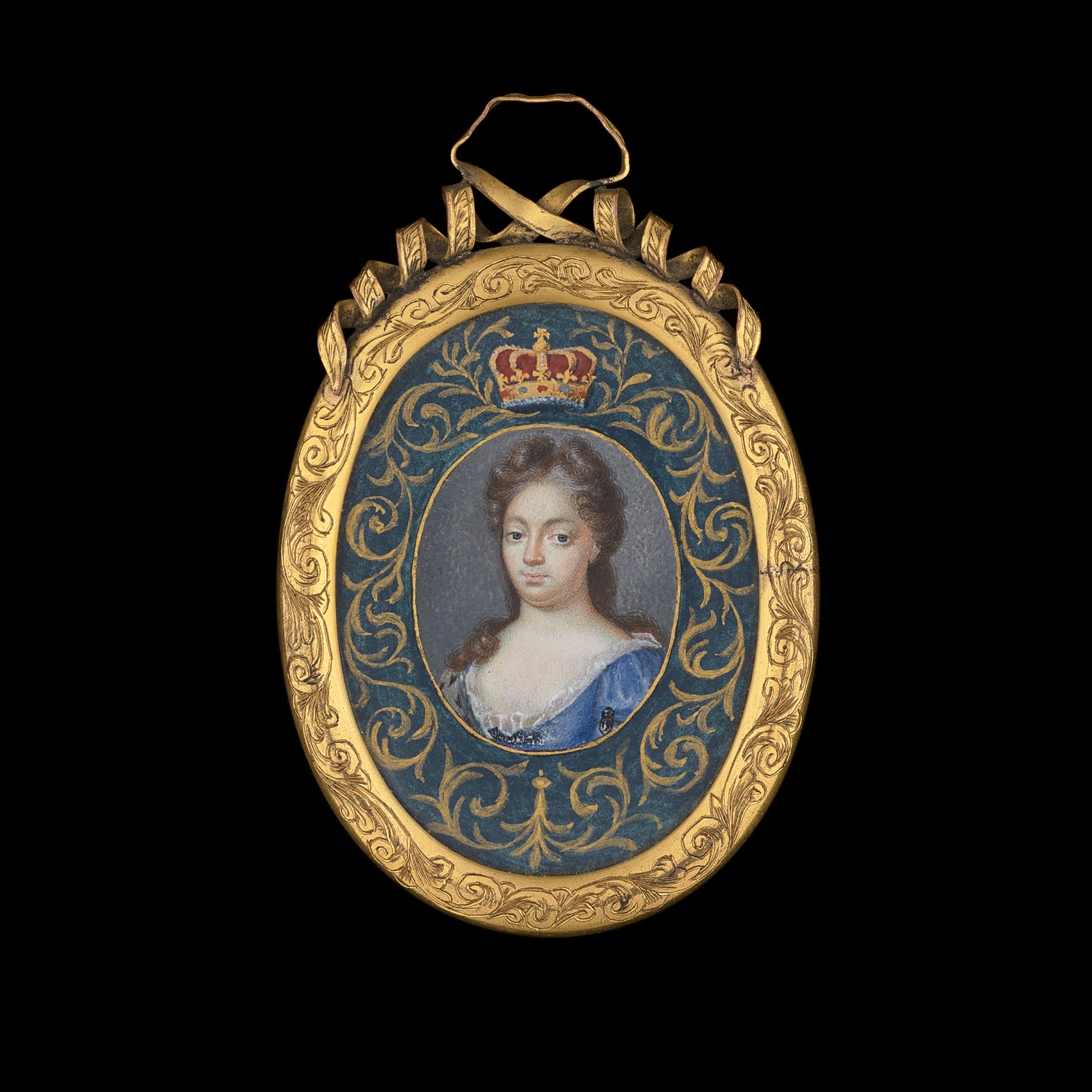 Later engraving on the reverse ‘Queen Mary/ Daughter of James 2nd/ and Consort of William 3rd/ Died December 1694’ Watercolour on vellum in gilded metal frame with engraved border and pierced spiral surmount Oval, 1 1/4 in (27 mm) high