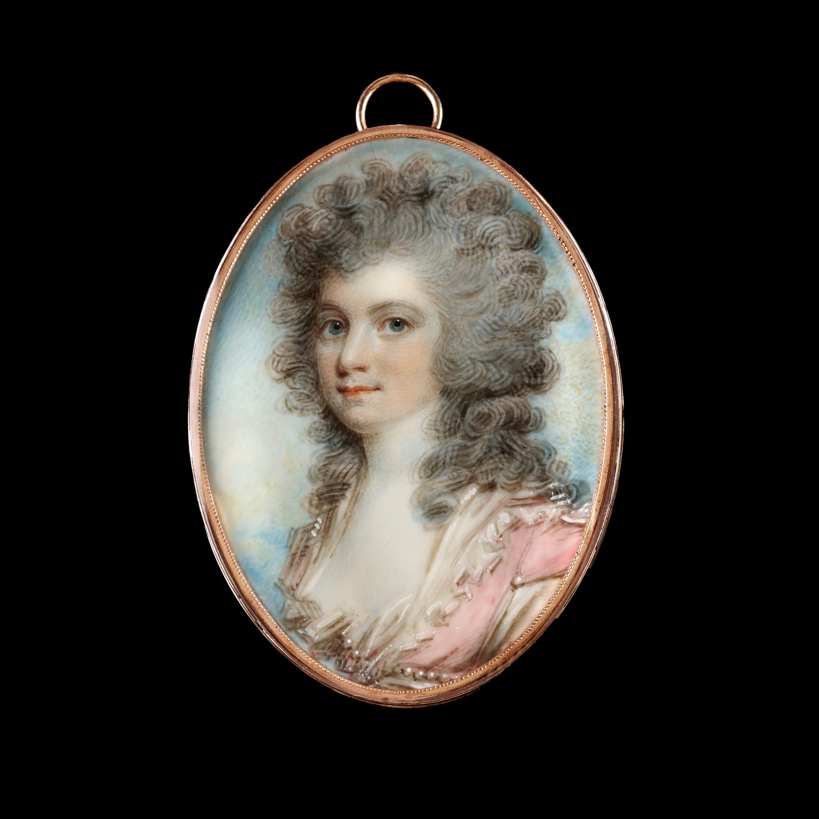 Watercolour on ivory set in original gold frame, the reverse with oval panel with plaited brown hair within right-cut border and set in original red leather travelling case Oval, 2 1/8 in (55 mm) high